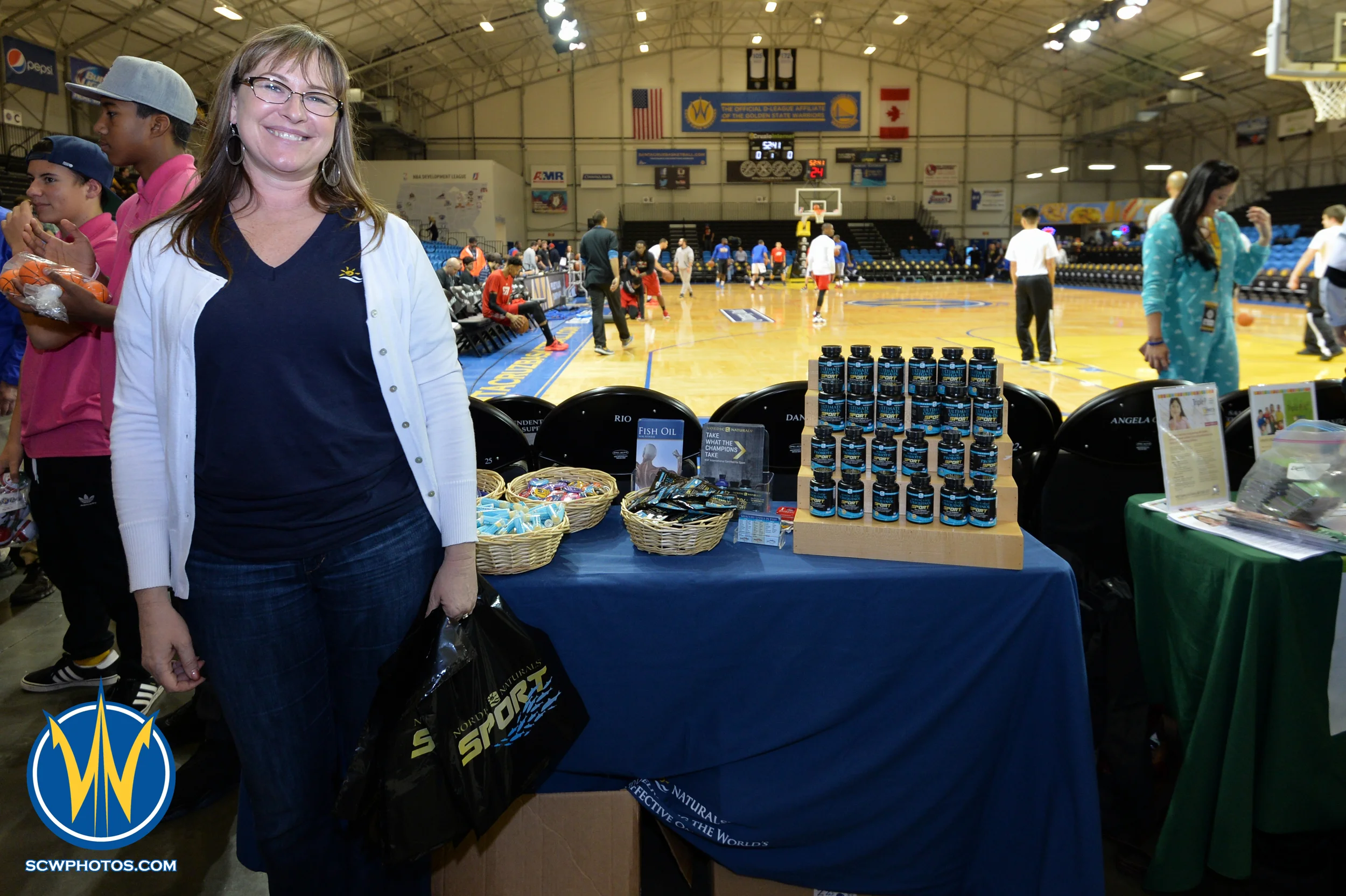 Local company showing and handing out giveaway products at the Santa Cruz Warrior game on 1/22/16 at Kaiser Permanente Arena in Santa Cruz California. (Phil Pasag/SC Warriors 2015)
