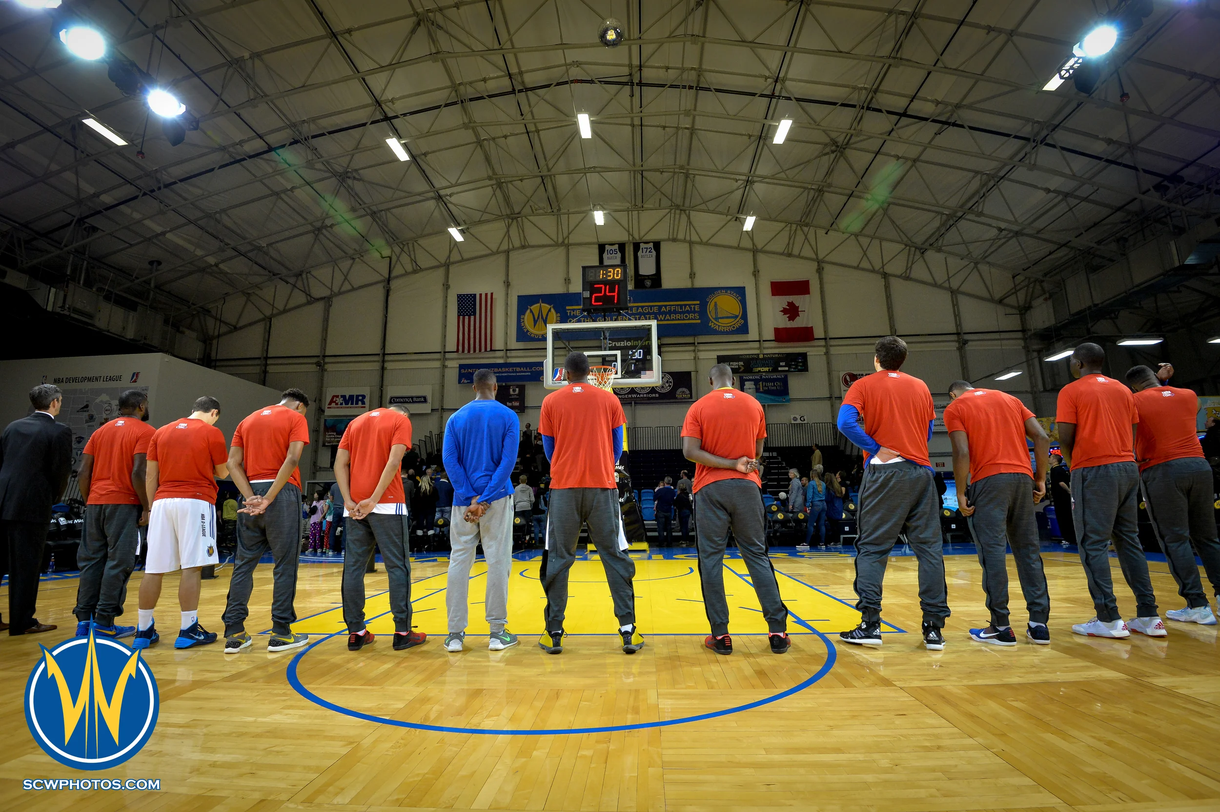 Santa Cruz Warriors bow there heads during the National Anthem at the Santa Cruz Warrior game on 1/22/16 at Kaiser Permanente Arena in Santa Cruz California. (Phil Pasag/SC Warriors 2015)