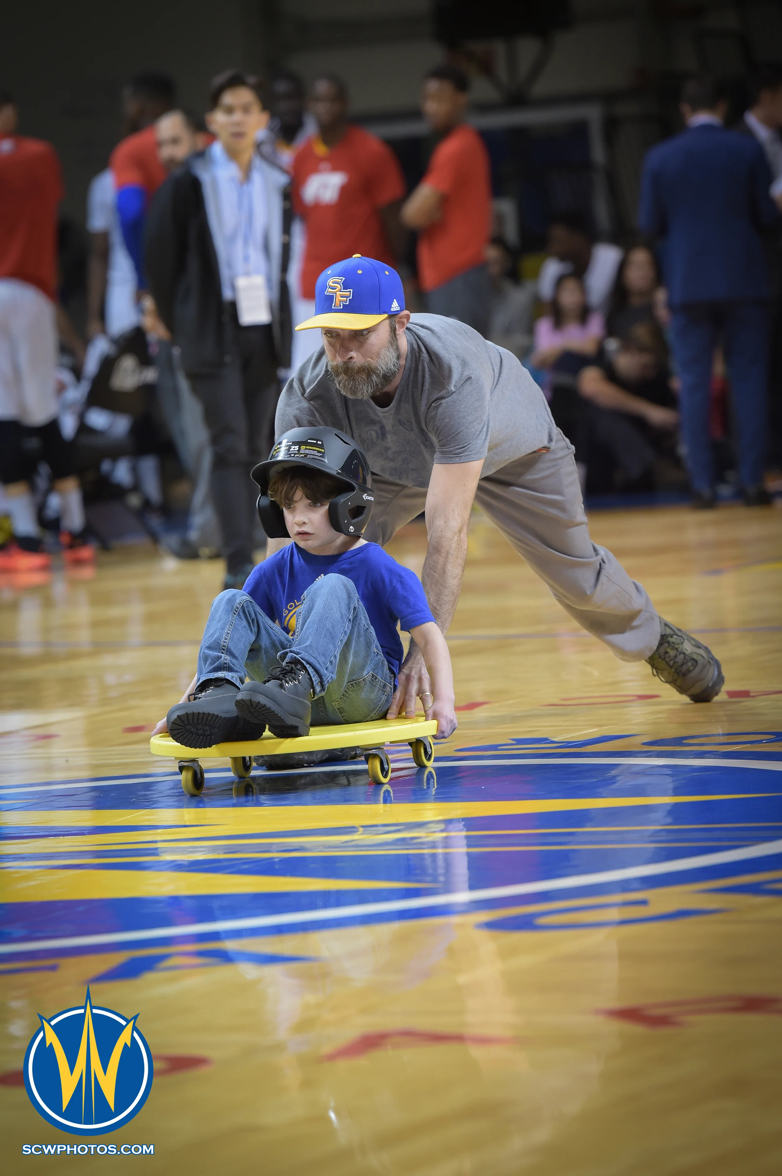 Warrior fan participates in a promotional game during a timeout at the Santa Cruz Warrior game on 1/22/16 at Kaiser Permanente Arena in Santa Cruz California. (Phil Pasag/SC Warriors 2015)