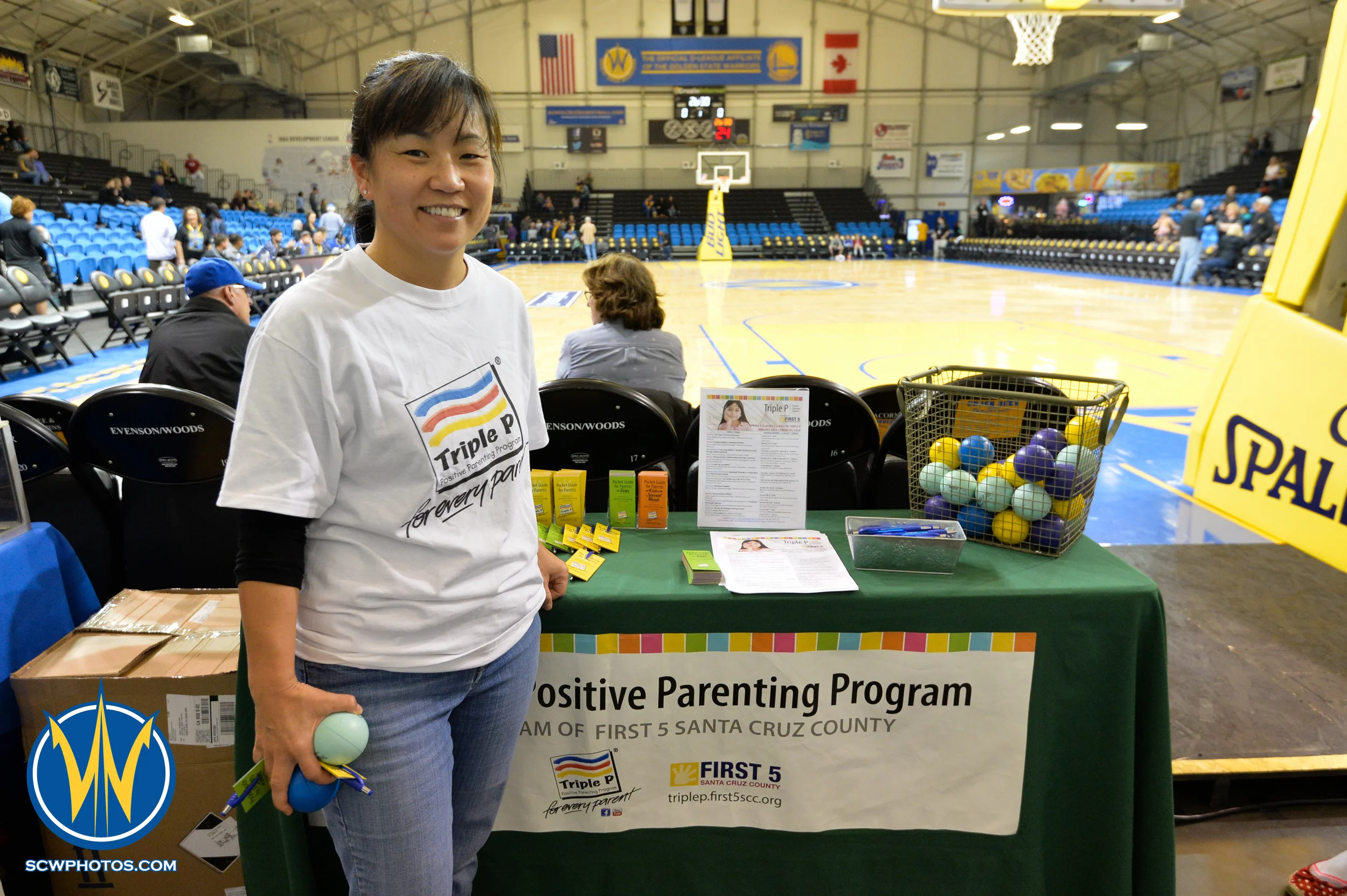 General Manager of the Positive Parenting Program posing for the camera at the Santa Cruz Warrior game on 1/23/16 at Kaiser Permanente Arena in Santa Cruz California. (Phil Pasag/SC Warriors 2015)