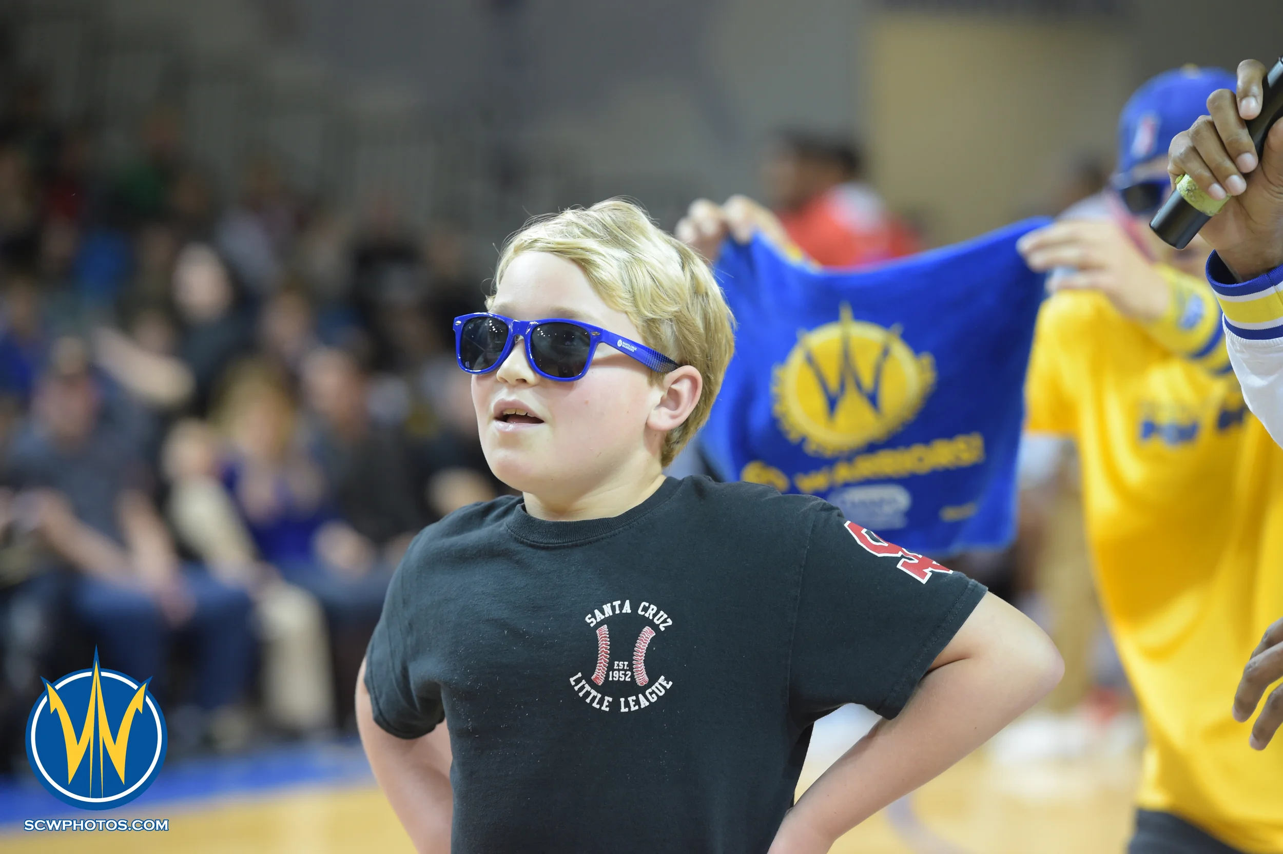 Warrior fan participates in a promotional game during a timeout at the Santa Cruz Warrior game on 1/23/16 at Kaiser Permanente Arena in Santa Cruz California. (Phil Pasag/SC Warriors 2015)