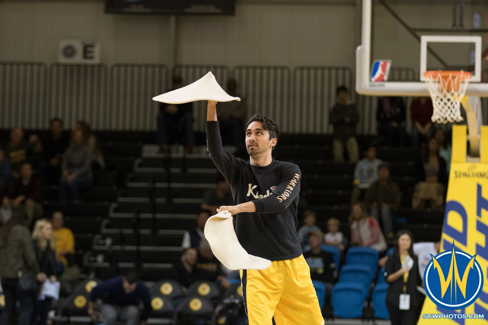 A performer from Kianti's Pizza performs during a timeout at Kaiser Permanente Arena on January 20, 2016 (Photo: Ariel Nava Photography)