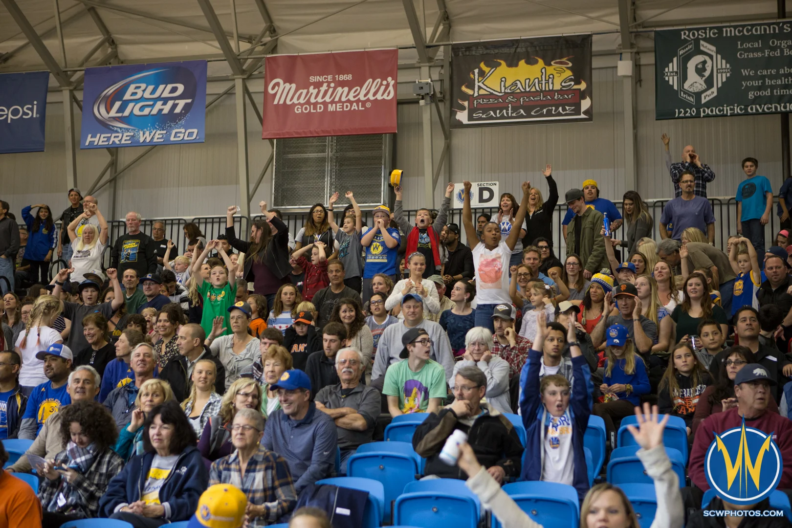 Cheering fans after the t-shirt give away by the Pod Squad at Kaiser Permanente Arena on February 19, 2016 (Photo: Ariel Nava Photography)