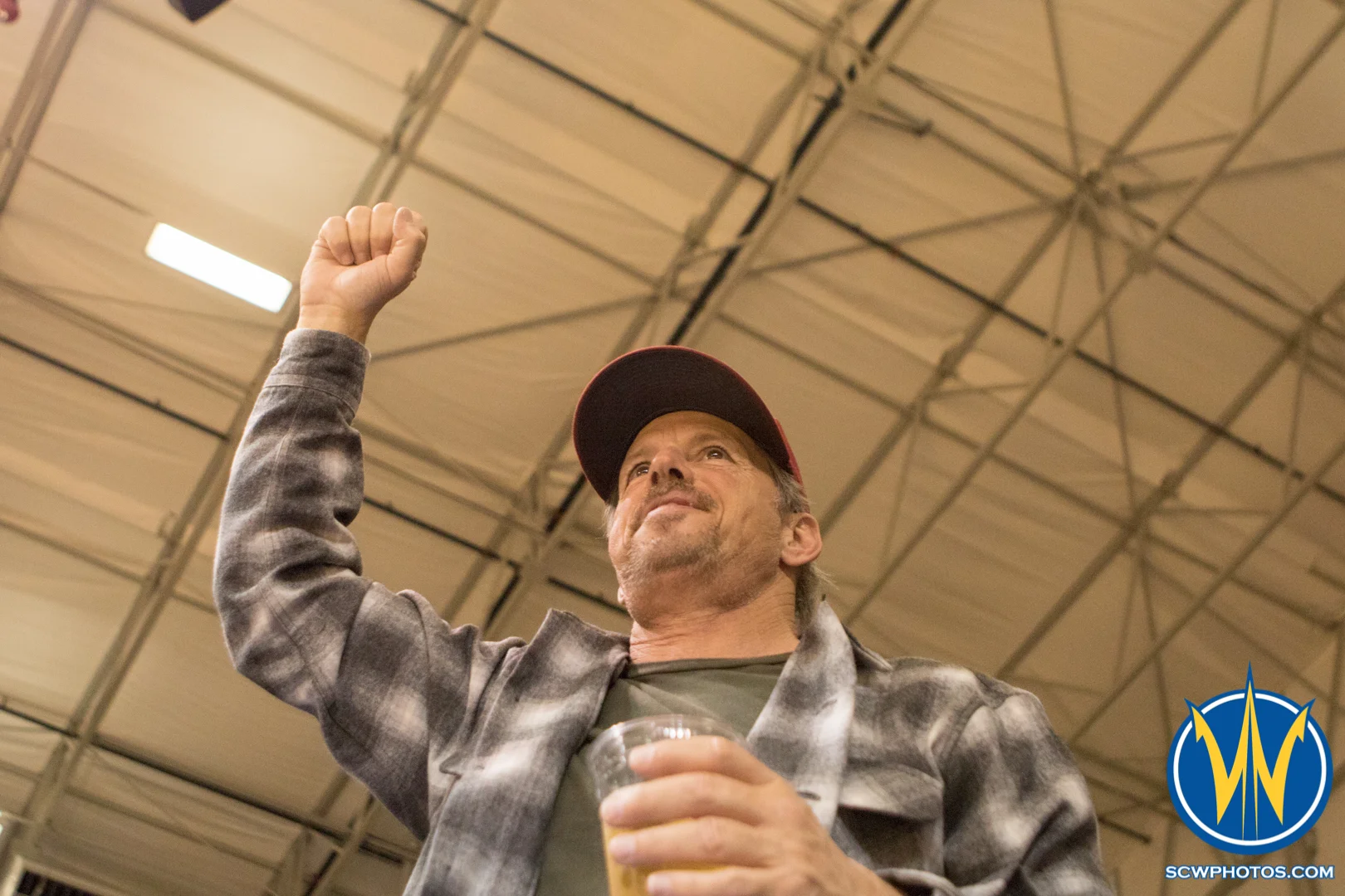 A fan cheers on the Warriors as they begin to pull away from the Bighorns at Kaiser Permanente Arena on February 26, 2016 (Photo: Ariel Nava Photography)
