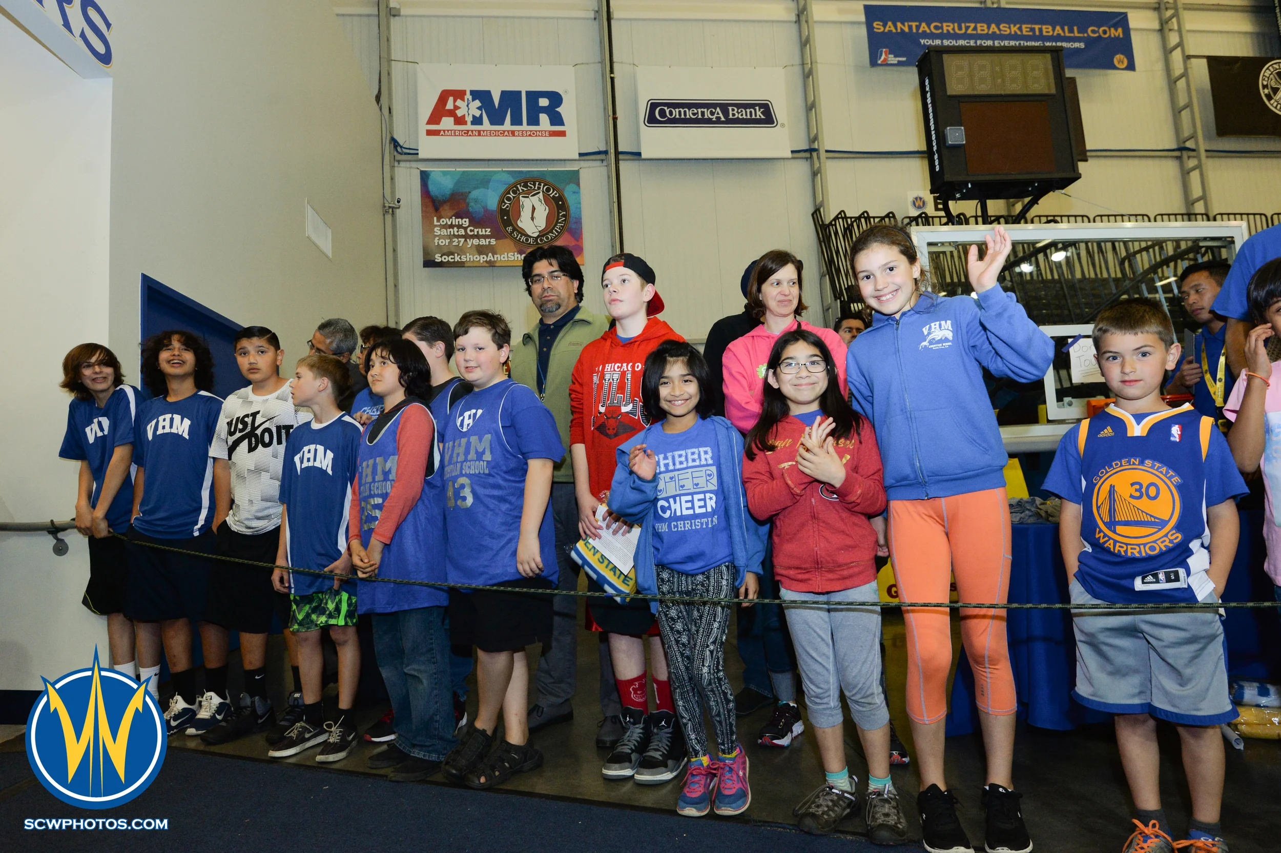 Young Warrior fans wait for the Warriors at the High Five tunnel at the Santa Cruz Warriors game on 3/2/16 at Kaiser Permanente Arena in Santa Cruz, California. (Photo: (Phil Pasag Photography) /SC Warriors 2015)