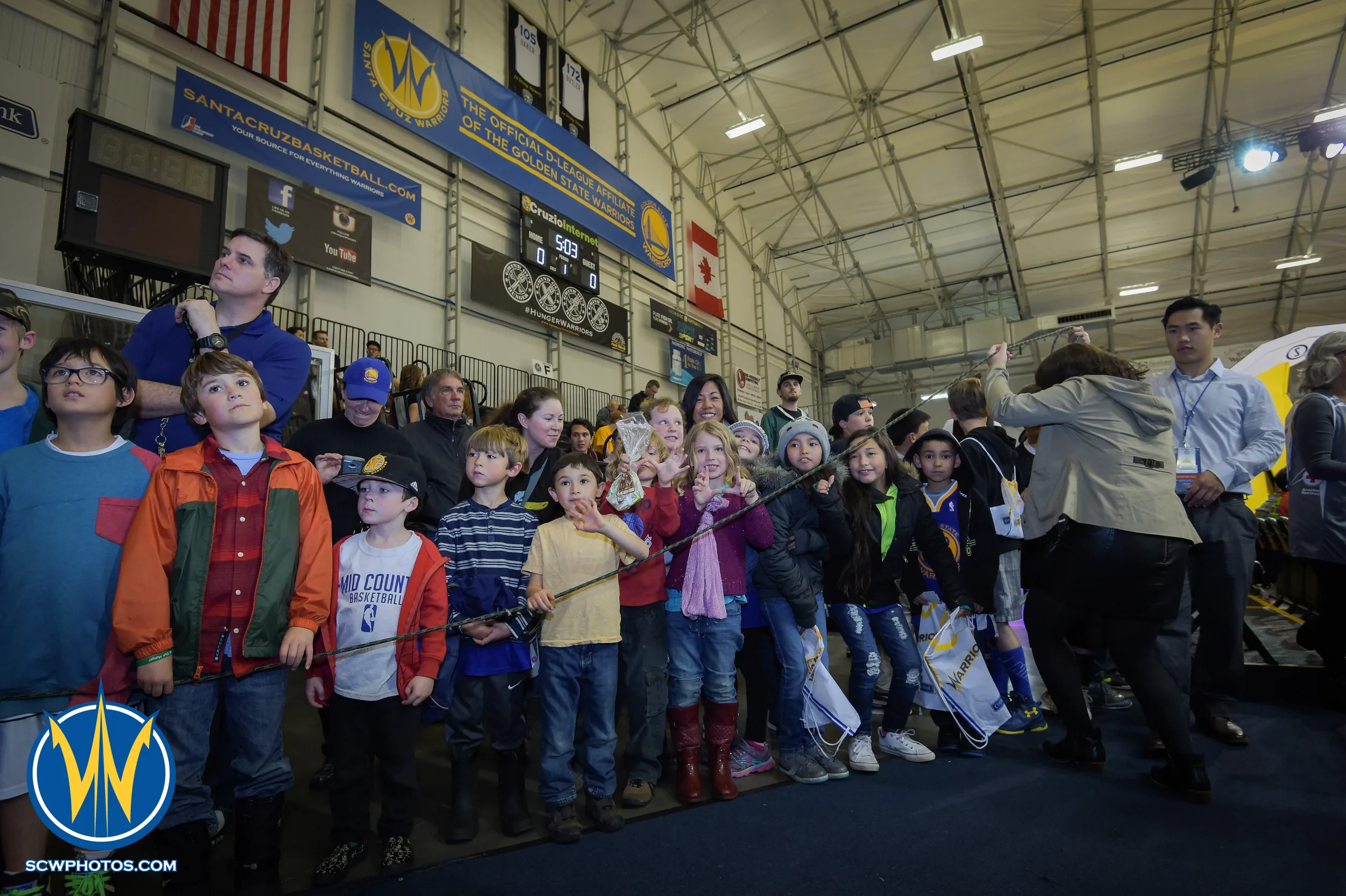 Warrior Fans waiting at the High Five Tunnel before the Santa Cruz Warriors vs Delaware 87ers on 3/13/16 at Kaiser Permanente Arena in Santa Cruz, California. (Photo: (Phil Pasag Photography) /SC Warriors 2016)
