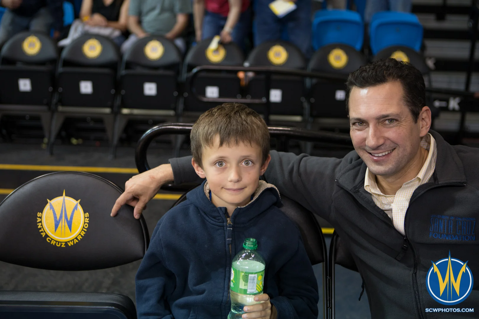 Son and father pose for a photo before the game at Kaiser Permanente Arena on March 18, 2016 (Photo: Ariel Nava Photography)