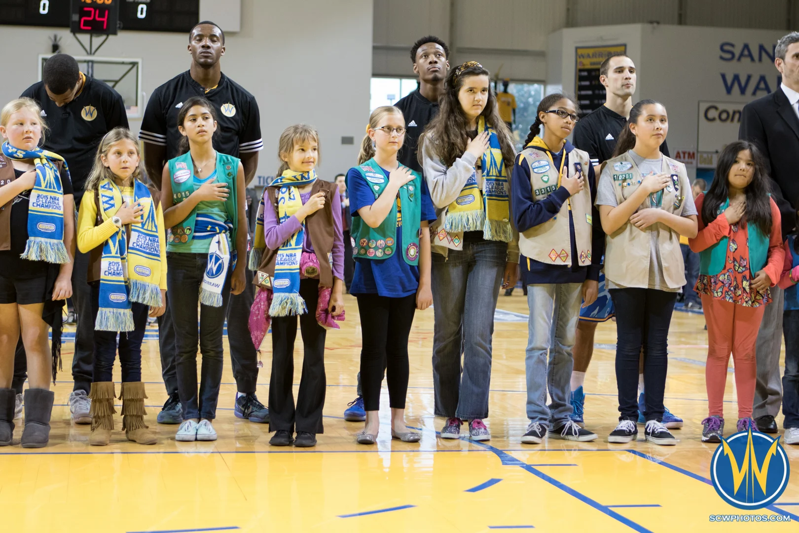 Young fans stand with players and coaches for the singing of the National Anthem at Kaiser Permanente Arena on March 24, 2016 (Photo: Ariel Nava Photography)