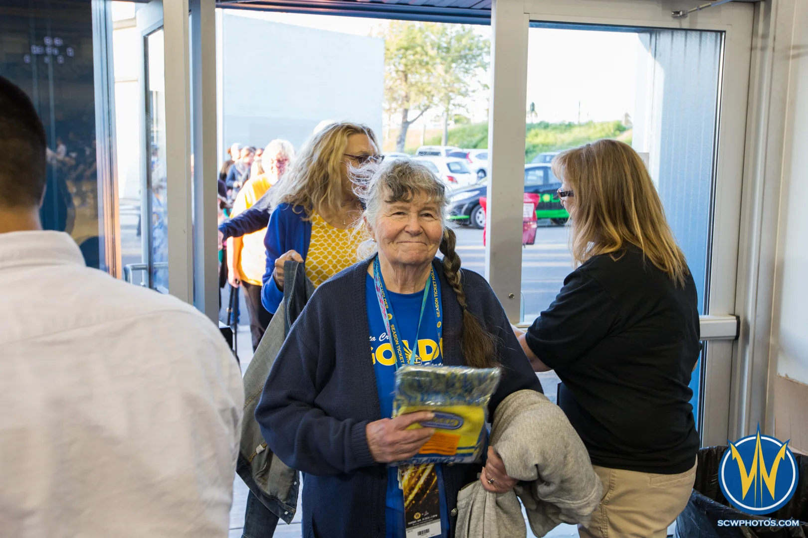 A loyal fan smiles as she enter Kaiser Permanente Arena on March 24, 2016 (Photo: Ariel Nava Photography)