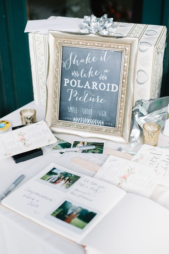 polaroid-wedding-guest-book-and-table.jpg