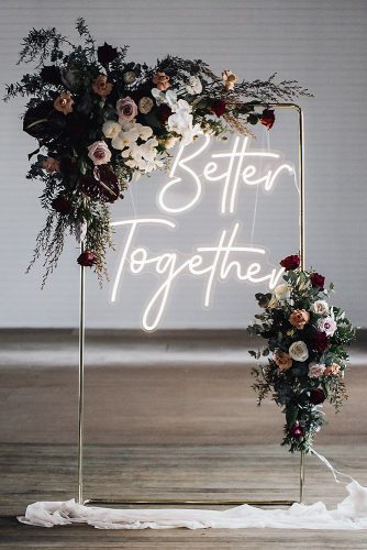 wedding-trends-2019-minimalistic-arch-dark-moody-flowers-and-neon-romantic-sign-littlepineappleneon-334x500.jpg