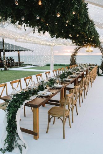 wedding-trends-2019-long-chic-rustic-table-with-greenery-and-gold-geometry-centerpieces-on-the-beach-axioo-334x500.jpg