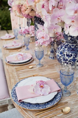 wedding-trends-2019-bridal-table-pink-orchids-eclectic-white-blue-vaces-and-glasses-duke-images-334x500.jpg