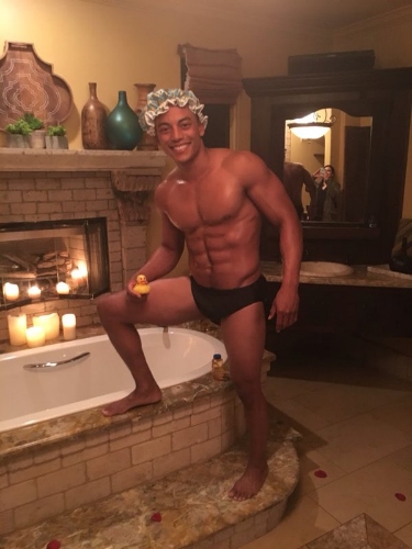 Christian loves bubble baths...and getting naked (Photo from twitter)