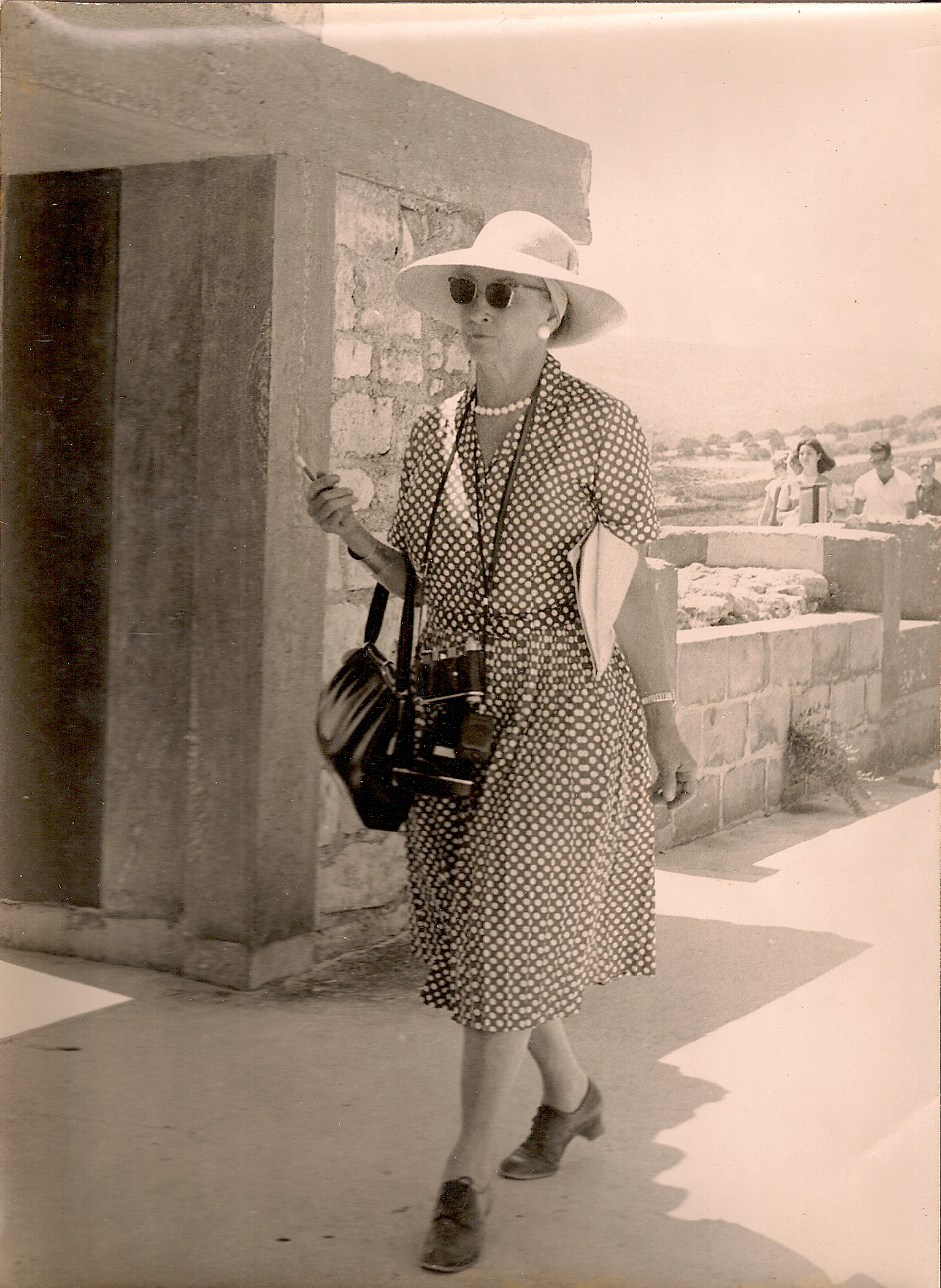 A world traveler late in life - Ann Riley exploring antiquity in Greece.