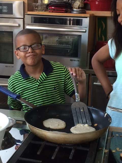Kolby helping out with the pancakes!