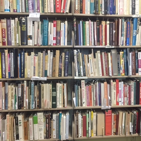 The wall of chef Paul Prudhomme's Cookbook Collection