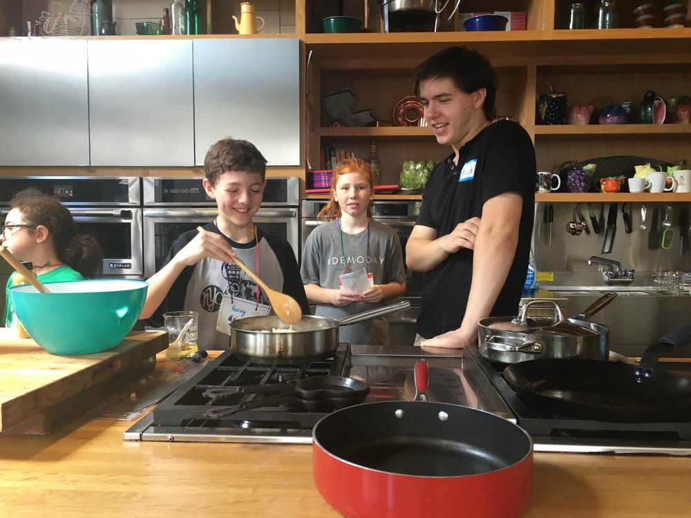 Nick cooking with kid.jpeg