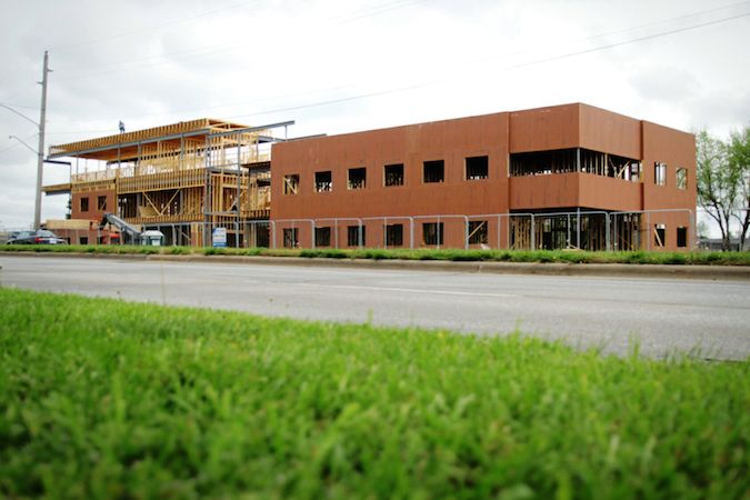 Buxton Kubik Dodd Creative designed Mike Fusek’s National Place and now is one of its anchor tenants. SBJ photo by WES HAMILTON