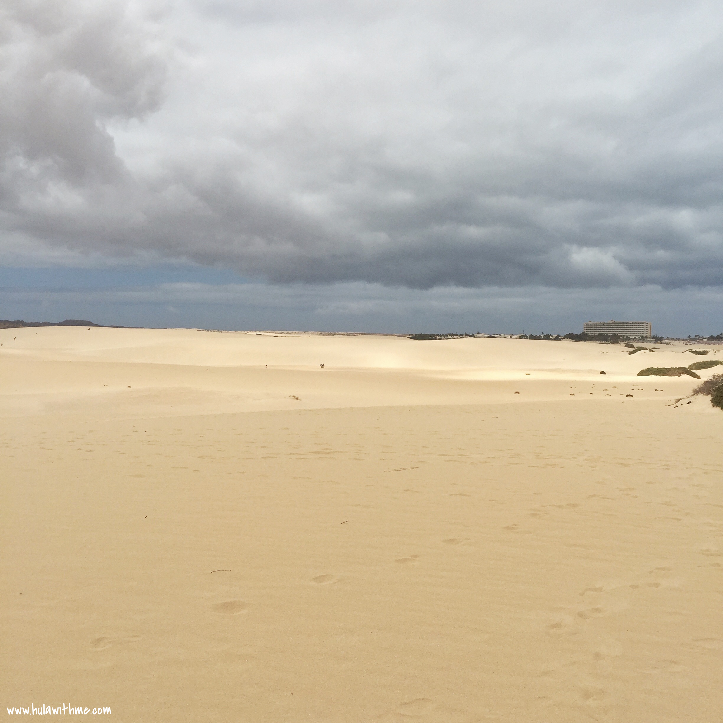 Nature Light Show - You can see a few brighter spots on the sand (toward the middle of the photo) and imagine these light spots keep moving along the white sand as the clouds above shift their positions.