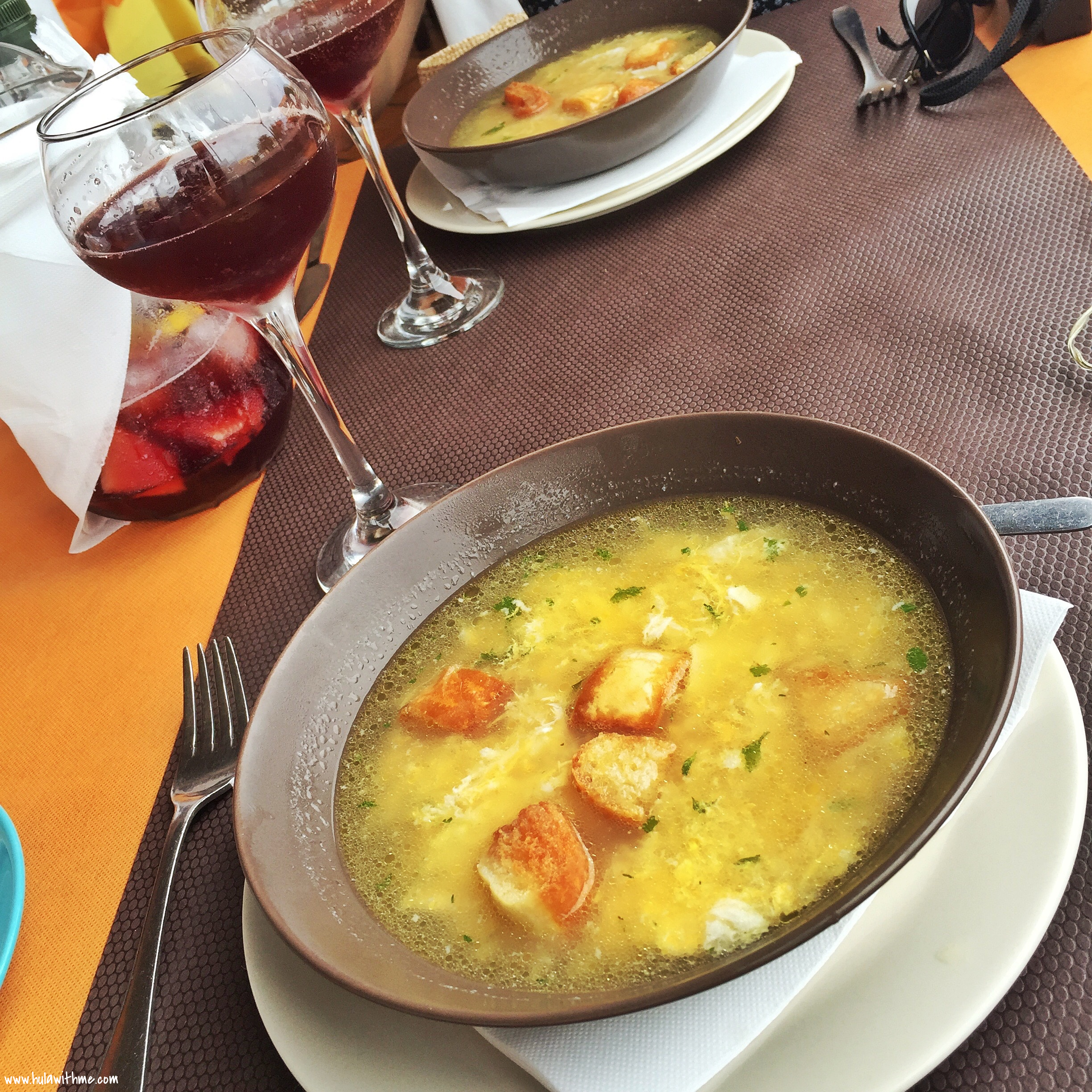 Canary Islands Food Finds - O'Fado Portuguese Restaurant. Acorda alentejana - a soup-like dish cooked with garlic, coriander, olive oil, vinegar, eggs, along with sliced bread; a glass of sangria.