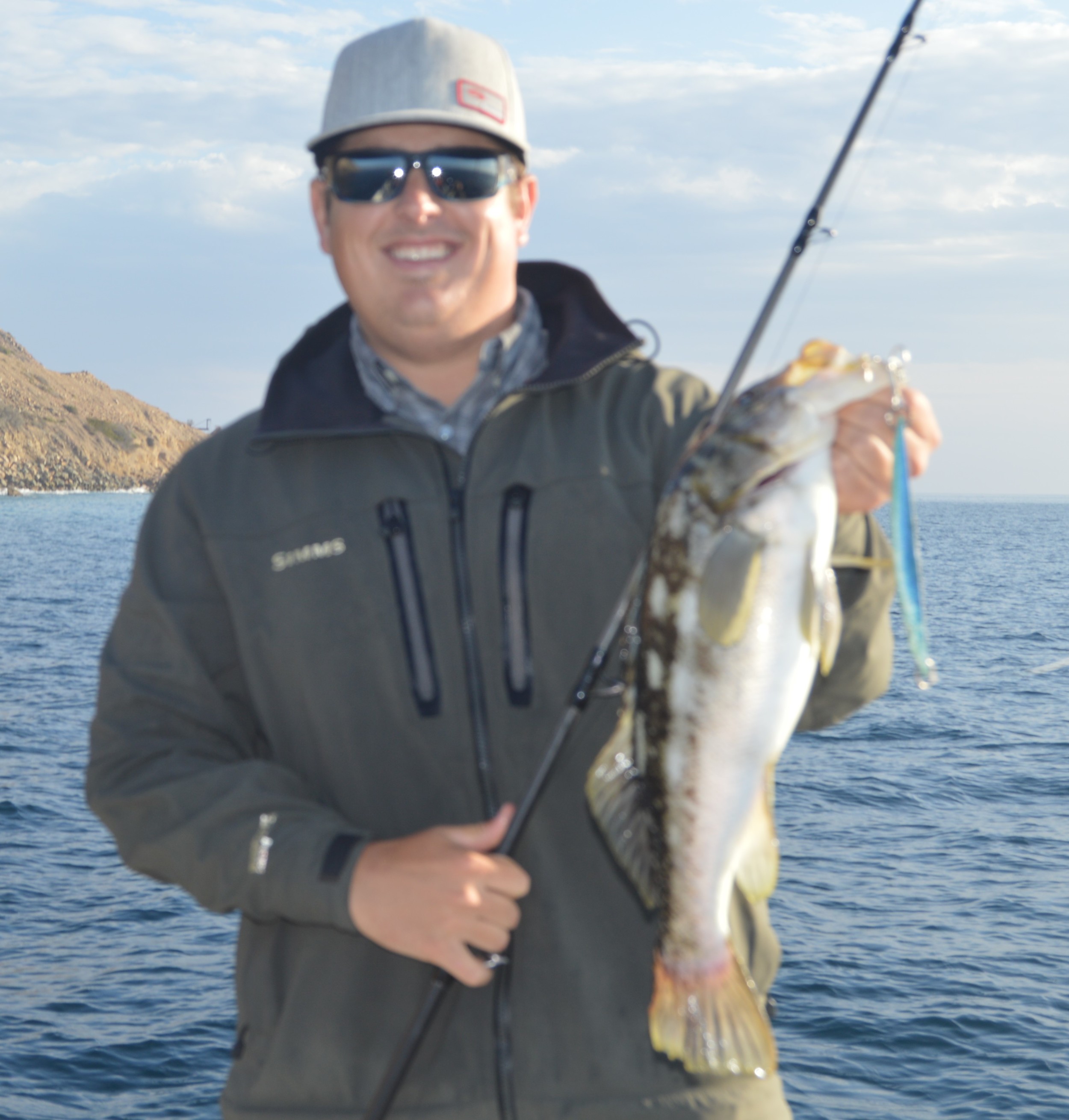 Kyle with a nice Catalina Island Calico Bass on a Surface Iron.