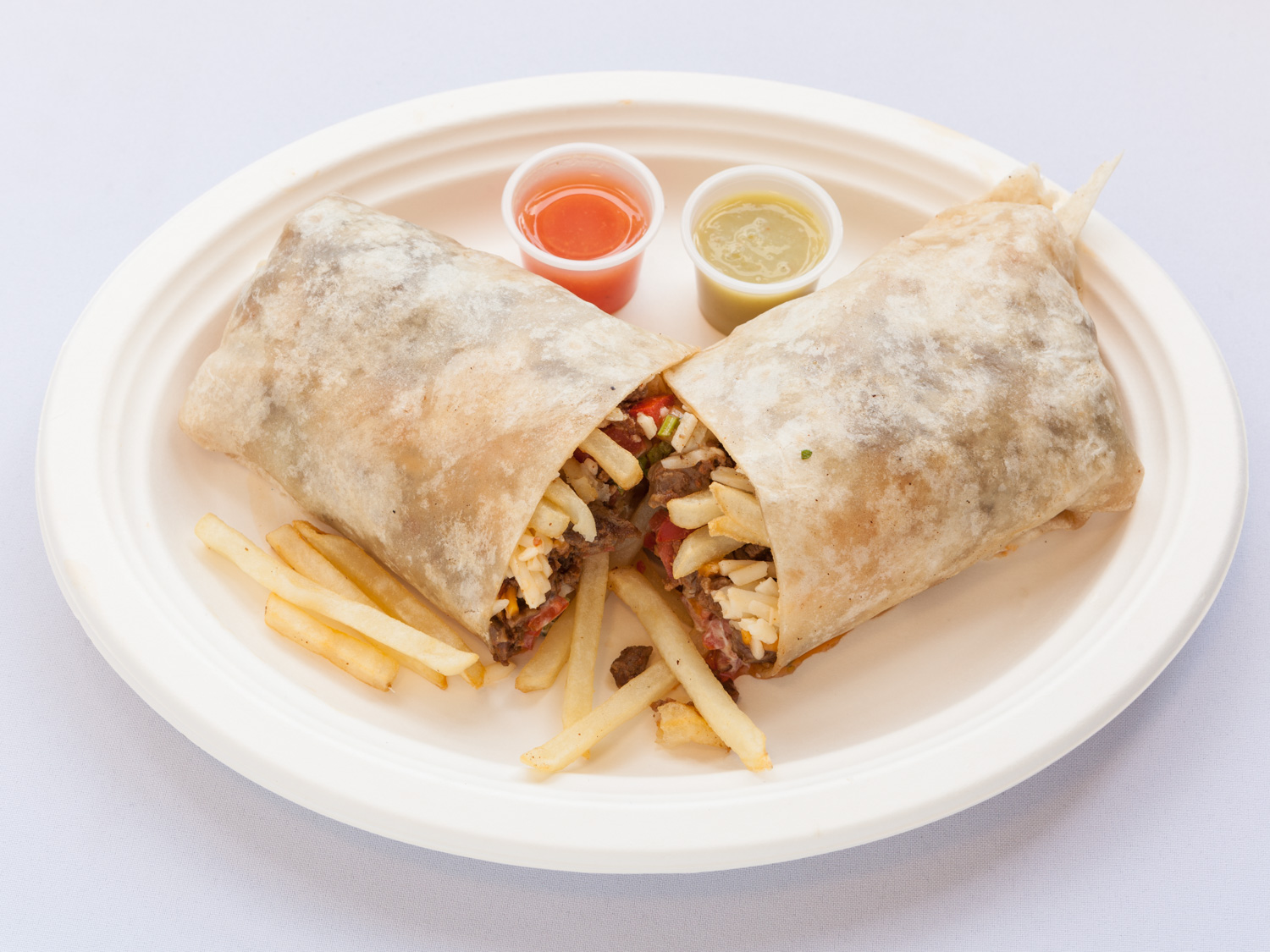 California Burrito - Tacos Chavez . I was shocked at how good this burrito was, stuffed with steak, french fries and all. I highly recommend this restaurant, which has a humble exterior, but good quality Mexican food inside. 