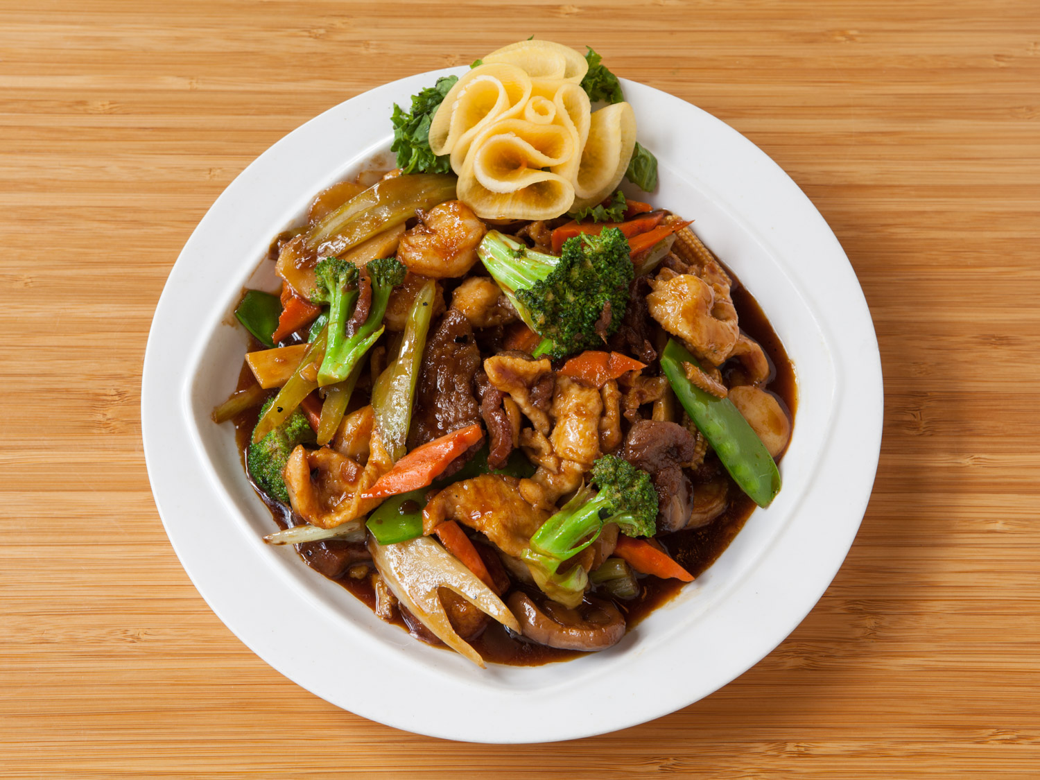 Happy Family - Dragonwell Bistro . It's the best Chinese food I've had in a long time. Tastes yummy, and healthy-- they don't go nuts with the salt, sugar or batter. Very nice ambience. Specializing in cuisine of the Hangzhou region of Southern China. 