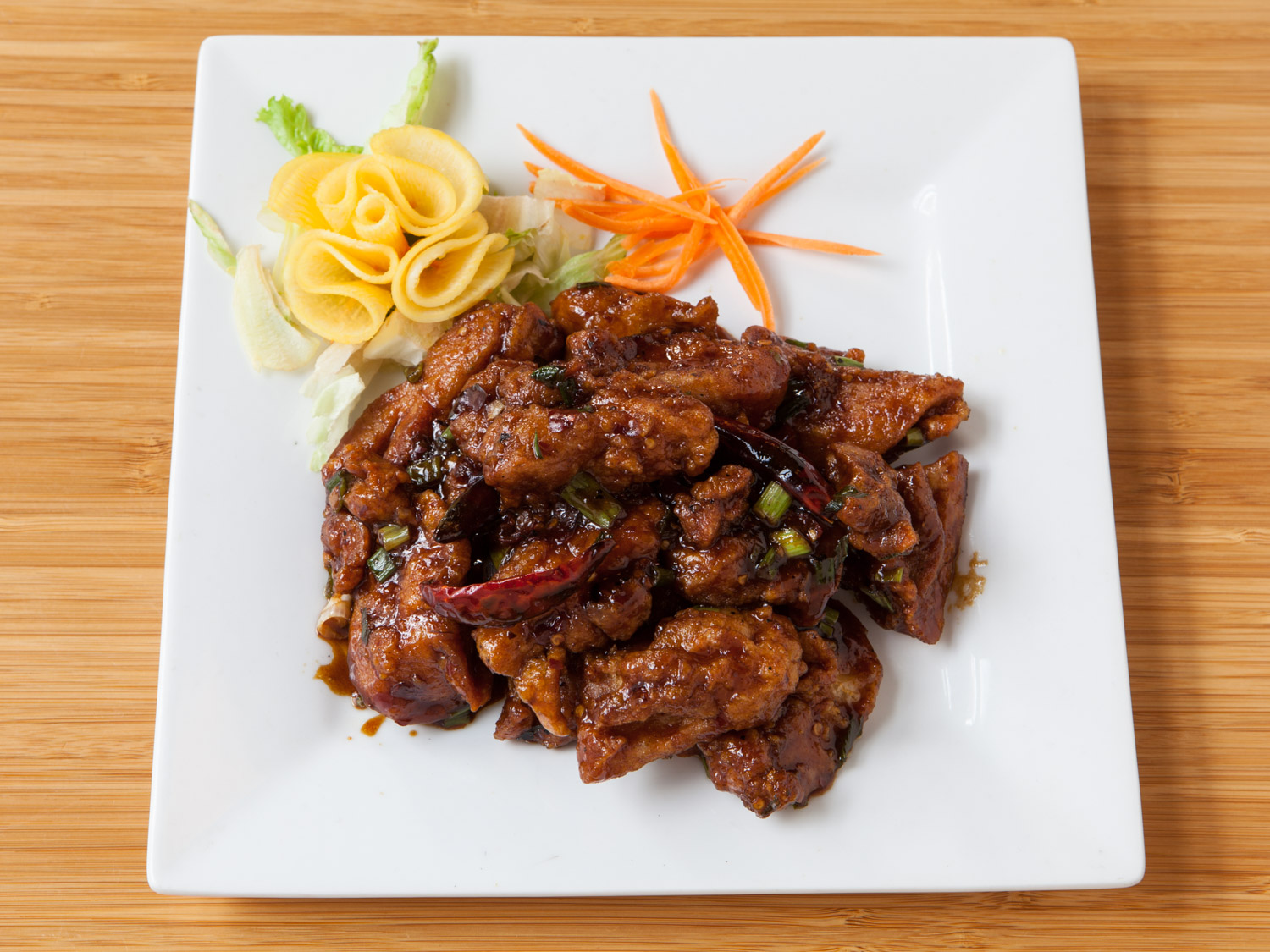 General Tso's Chicken - Dragonwell Bistro . I brought some home to share with my family. My 2-year-old son Charlie loved it and said he wanted some more "Big Toe Chicken."