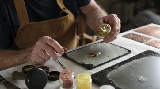 Michael Phillips mixing historic pigments with linseed oil