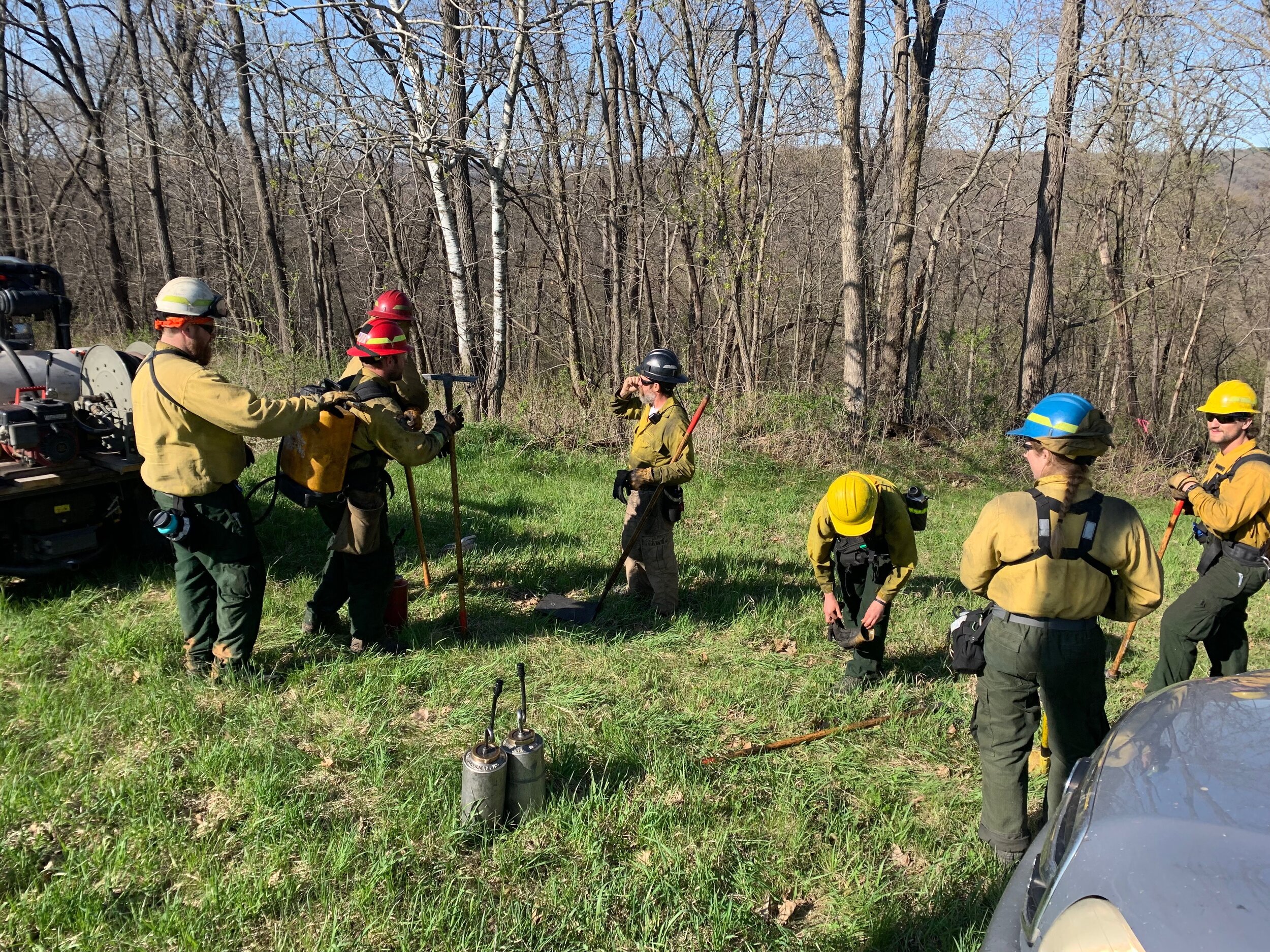  Crew members are designated specific roles, equipment, and tools. Crew members test equipment and tools prior to the burn. 