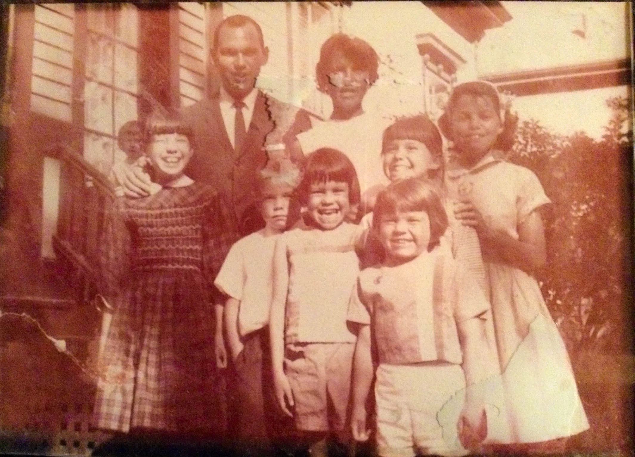 My Nana and family. My mom is the one in the front. The clothing is all made by hand.