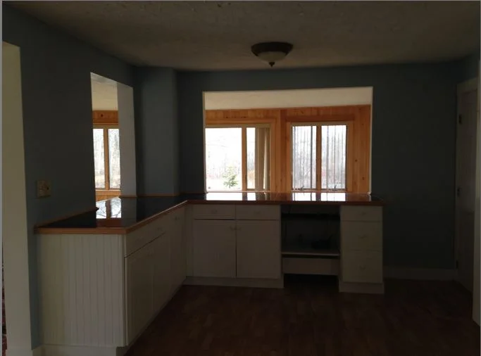 We removed the cabinets going into the living room to allow for better flow