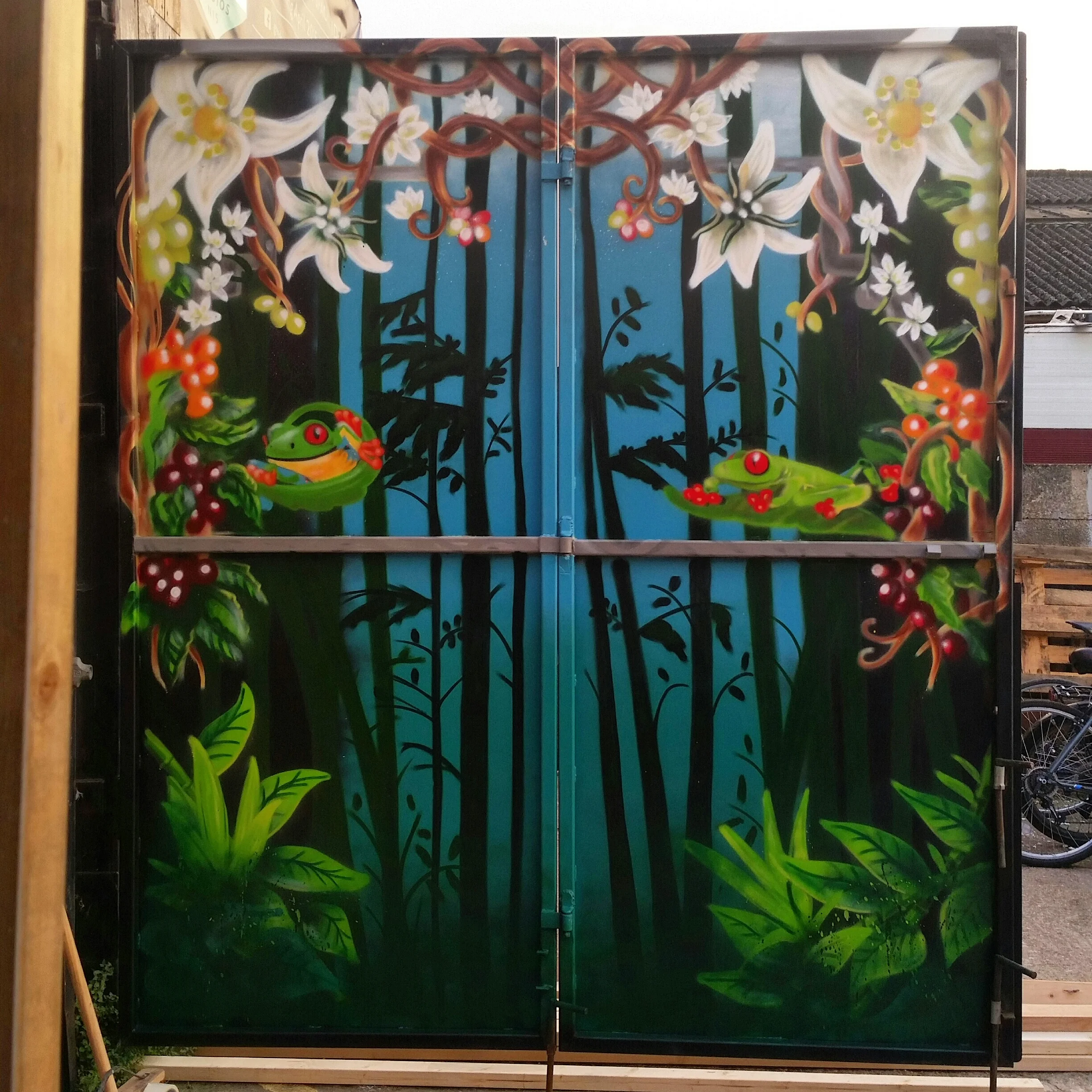 Work to paint shutter doors at "Craving Coffee, Seven Sisters, London
