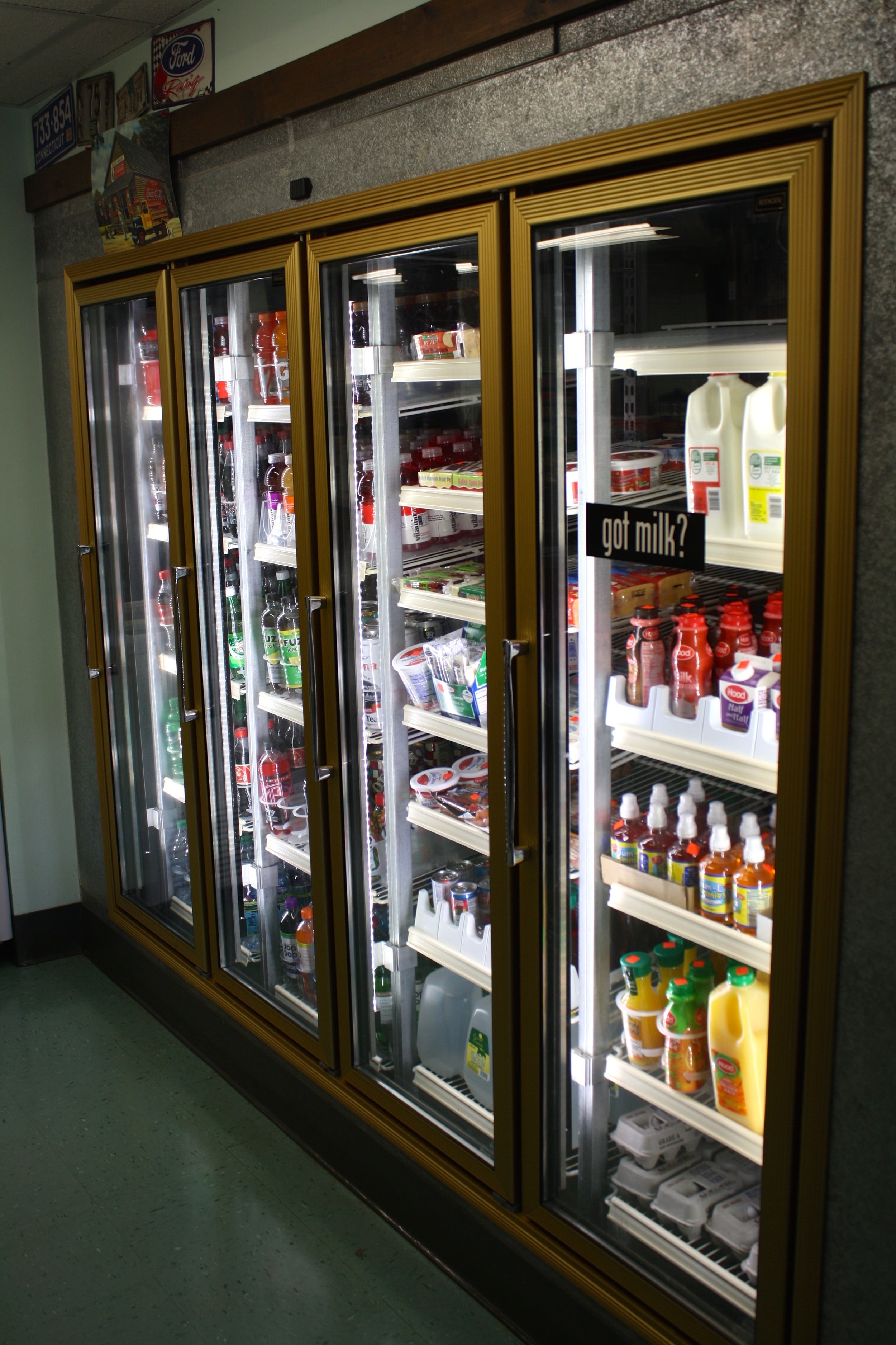 soda, water, milk, and snacks in the cooler