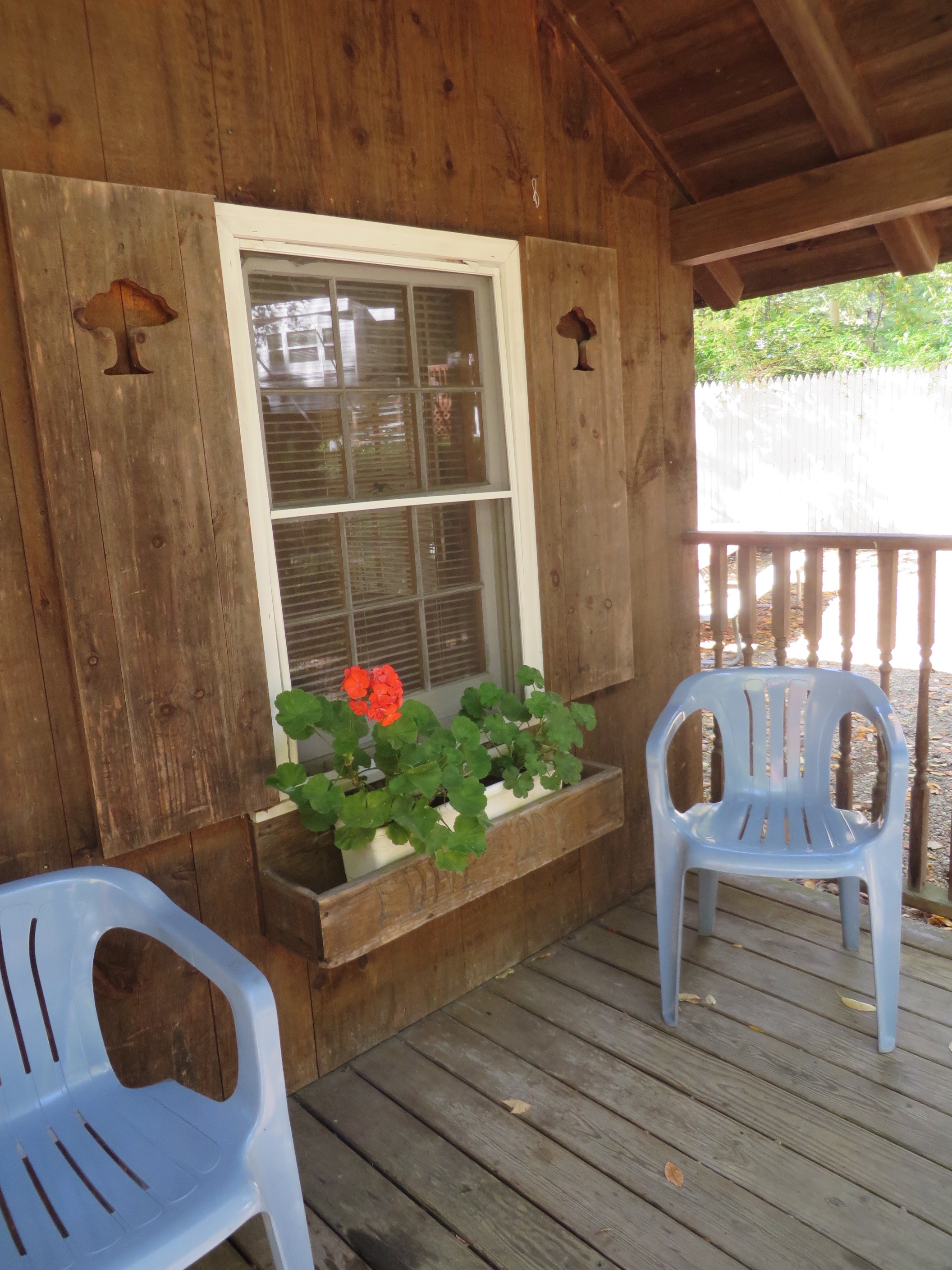 front porch with chairs at the cabin