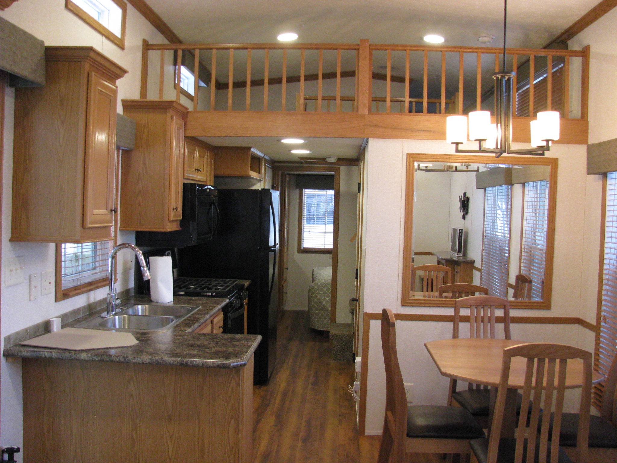 kitchenette, dining room, and loft of skyline trailer