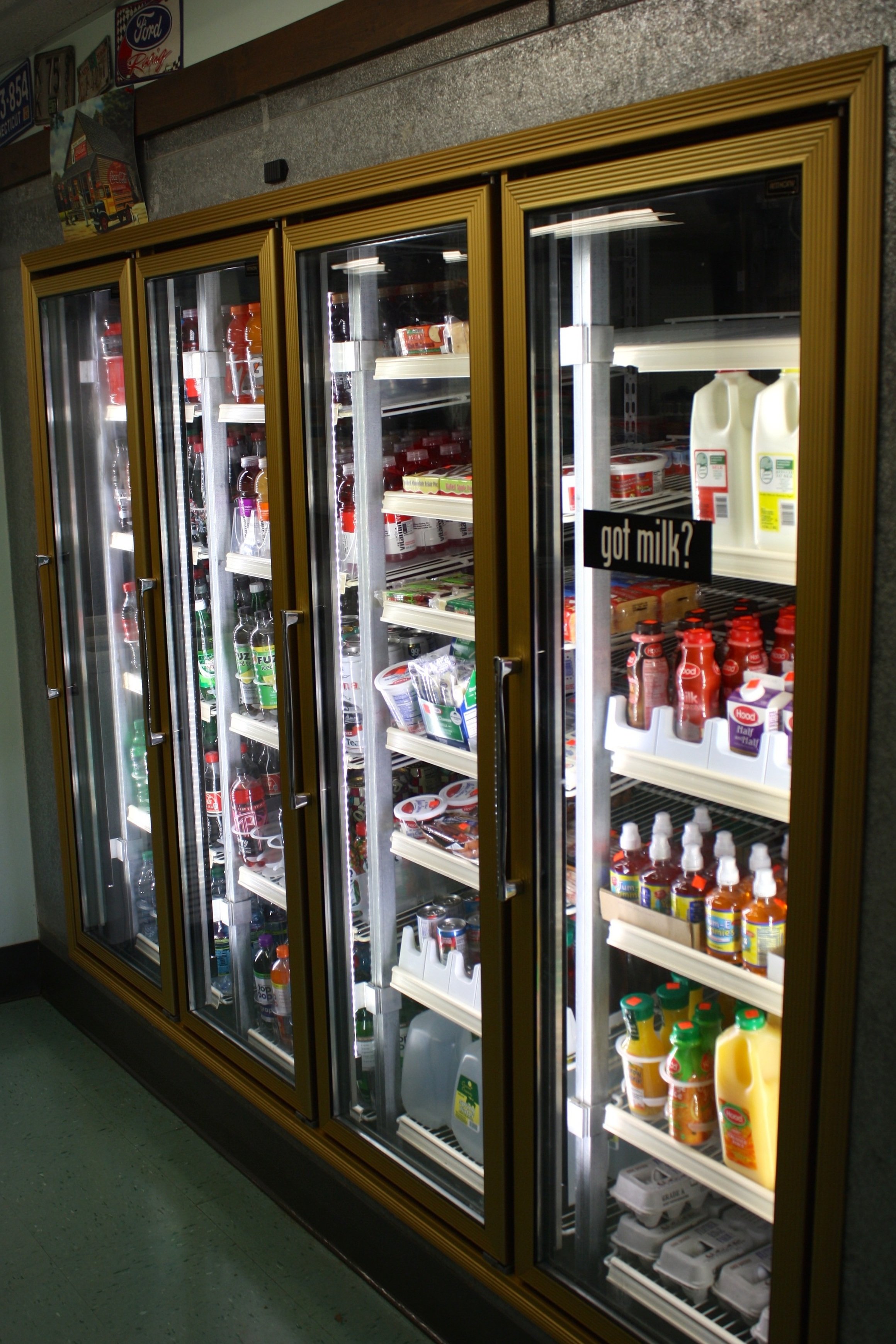 soda, water, milk, and snacks in the cooler