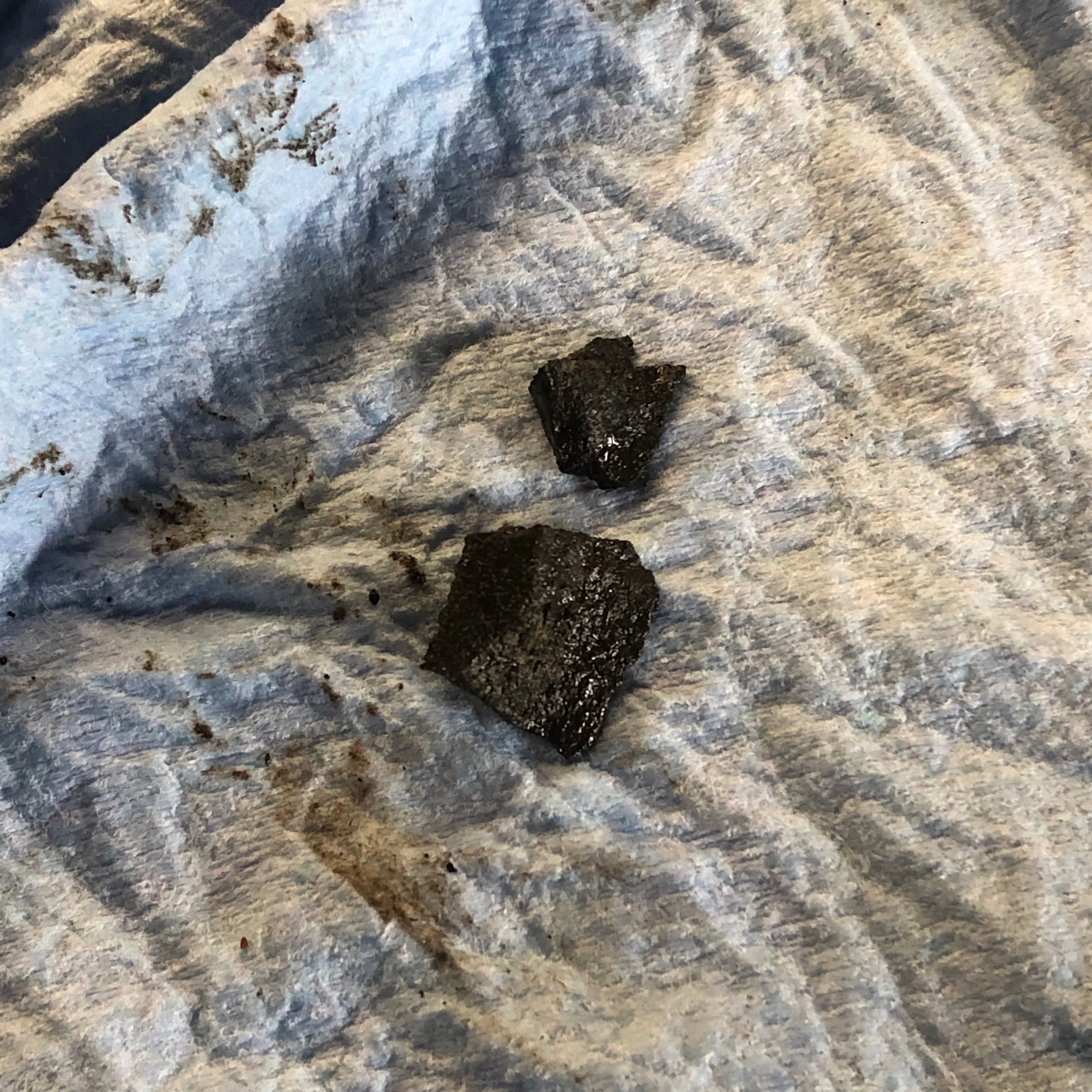 Solid chunks of congealed dirt from the block