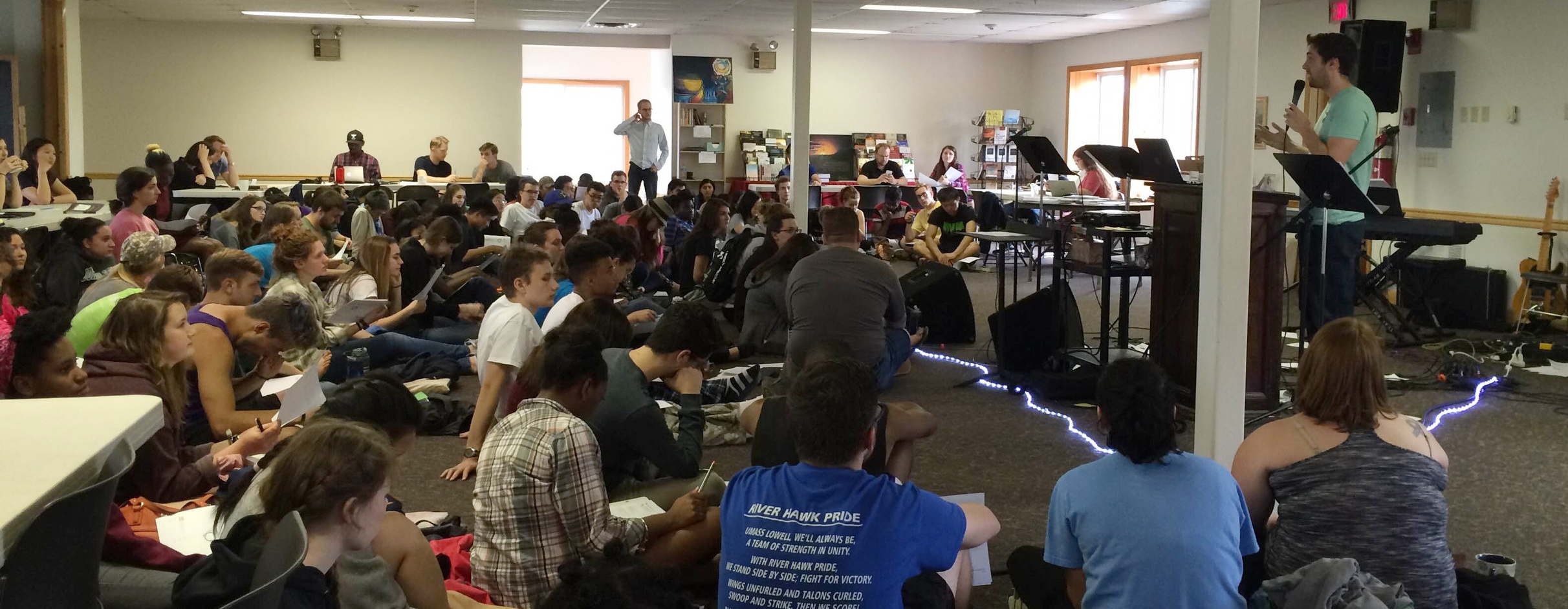 Zack leading 115 students at Summit on how to make good, God centered plans for leading a Bible study small group.
