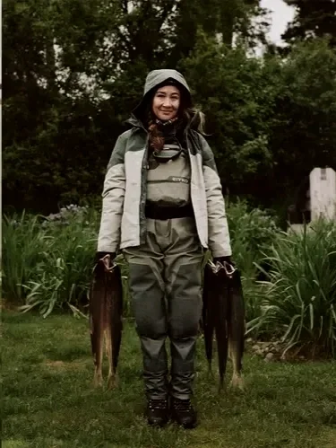 Woman holding salmon