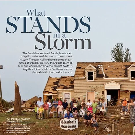 Neighbors standing in front of a house damaged by a tornado