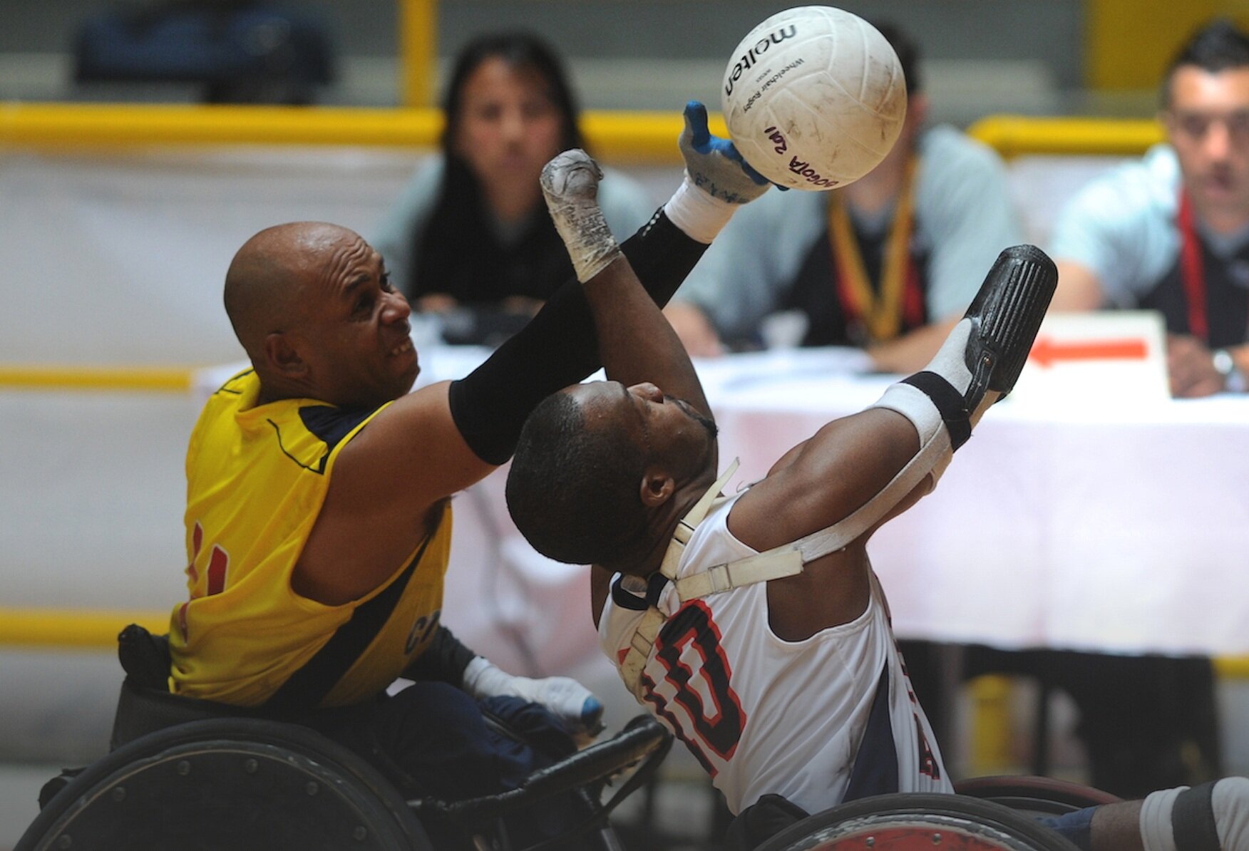 Man with no hands playing wheelchair rugby