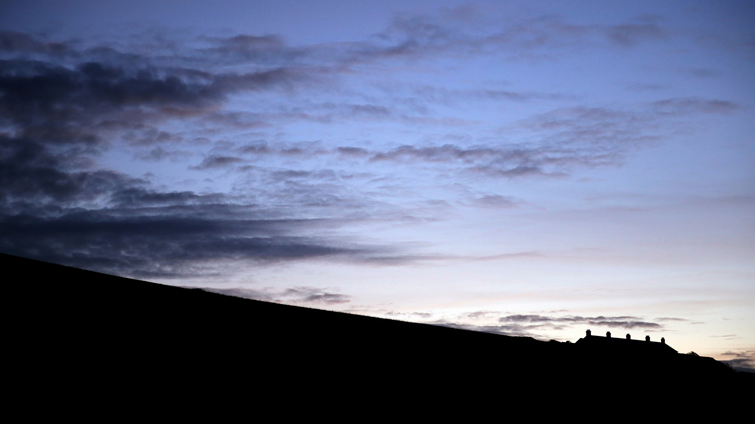 Isle of Wight, 2016. Clouds clear as the sun sets.