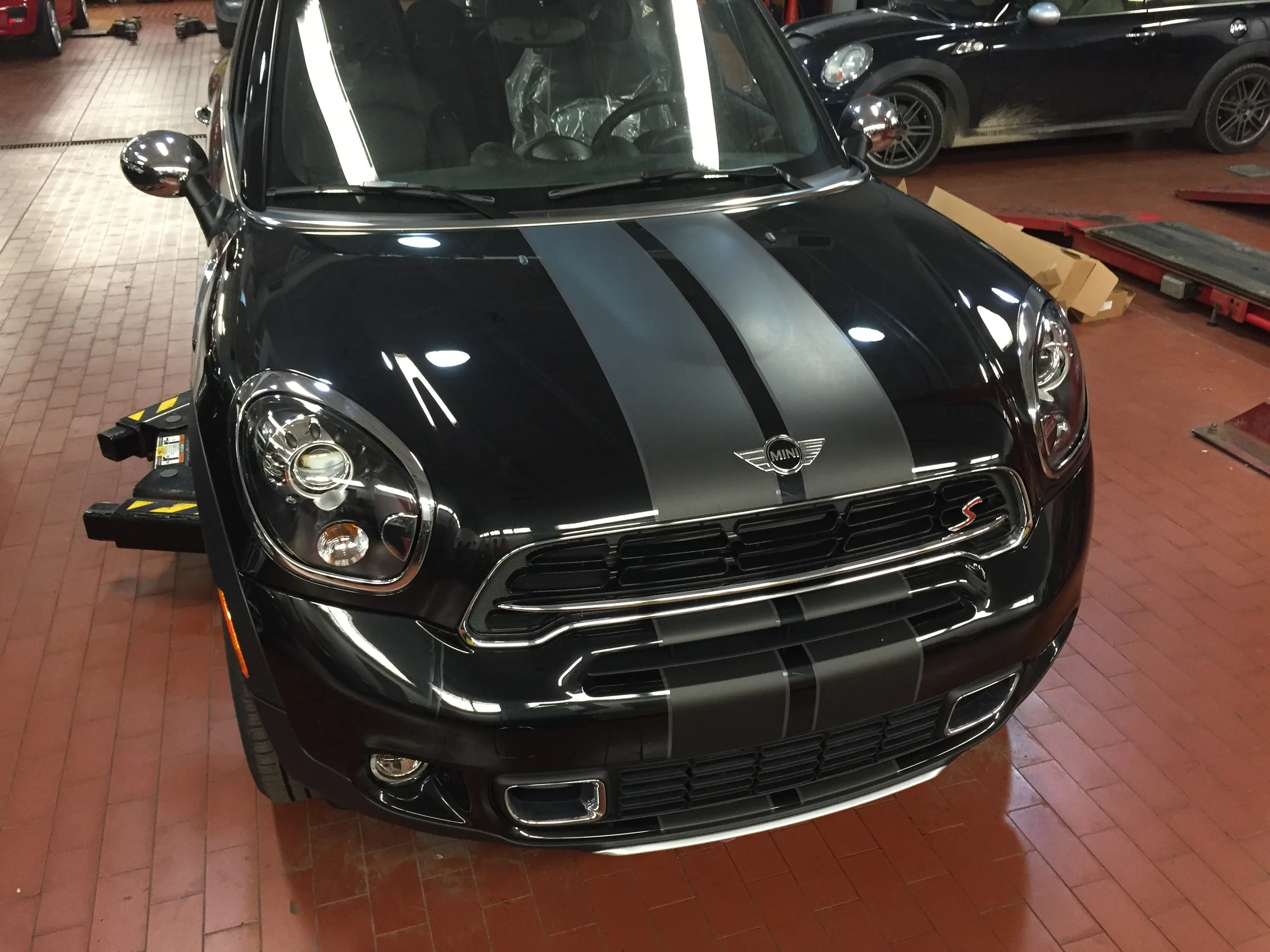 Matte black with dark silver pinstripe.