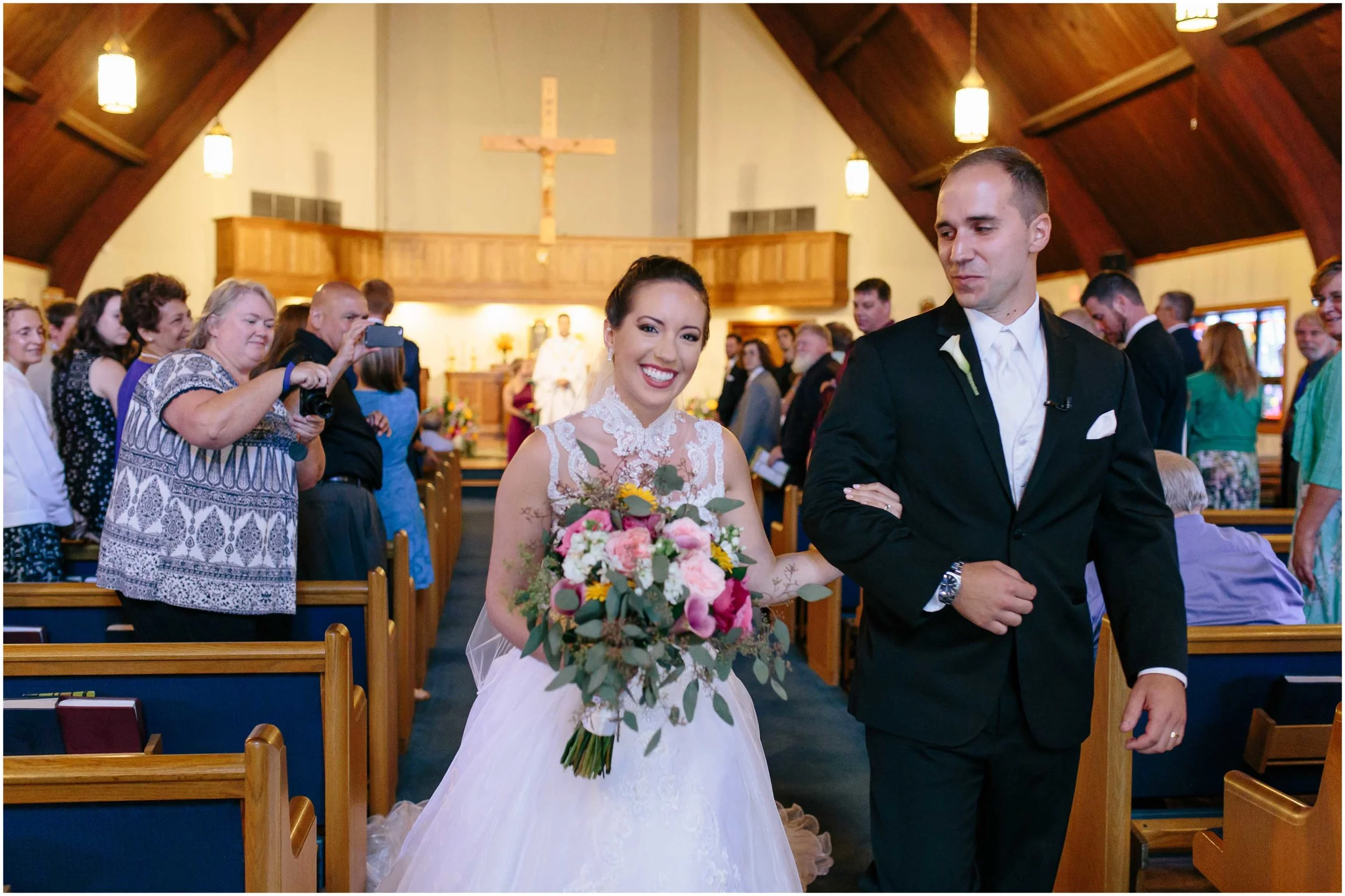 Chic New Hampshire Wedding at Manchester Country Club Bedford - Immaculate Heart of Mary Church bride and groom exit