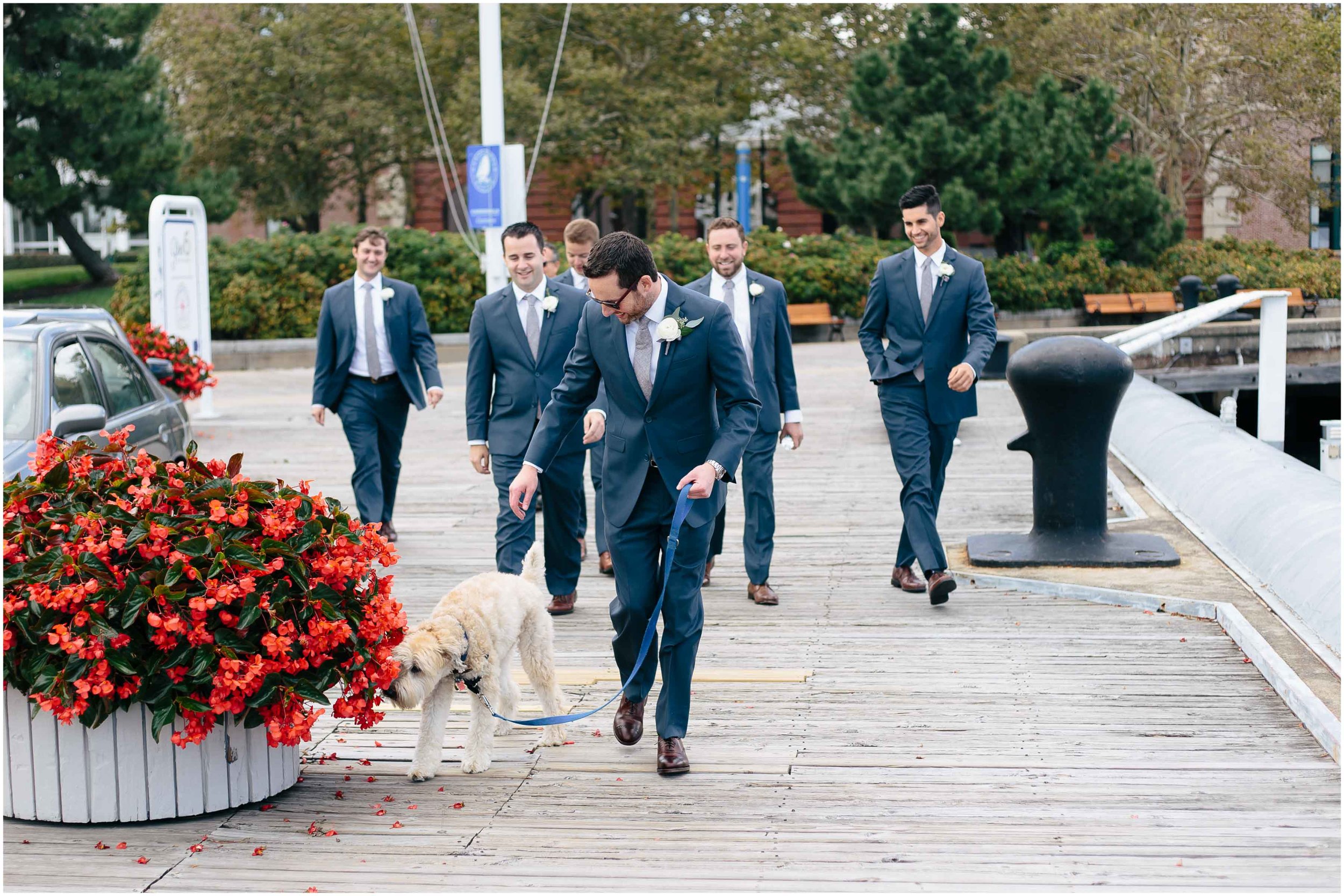 Nautical Massachusetts Jewish Wedding in the Boston Navy Yard groom and groomsmen and dog