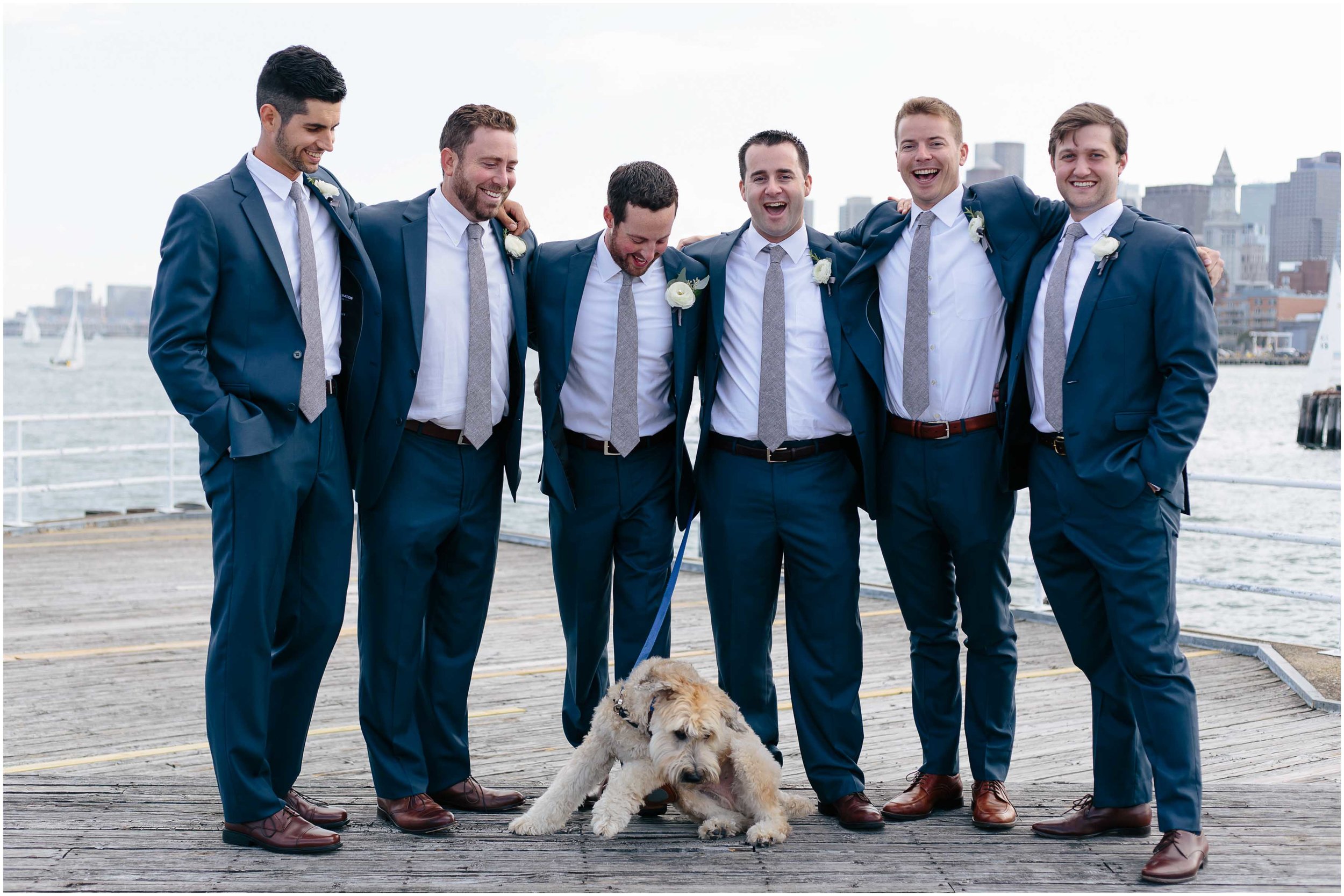 Nautical Massachusetts Jewish Wedding in the Boston Navy Yard laughing groom and groomsmen and dog