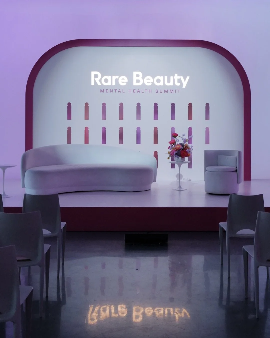 Designing stories, moments, and feelings.

In New York City, the @rarebeauty Mental Health Summit was designed around connection and conversation through ambient lighting, blush-toned palettes, curved stage elements, immersive product activations, an
