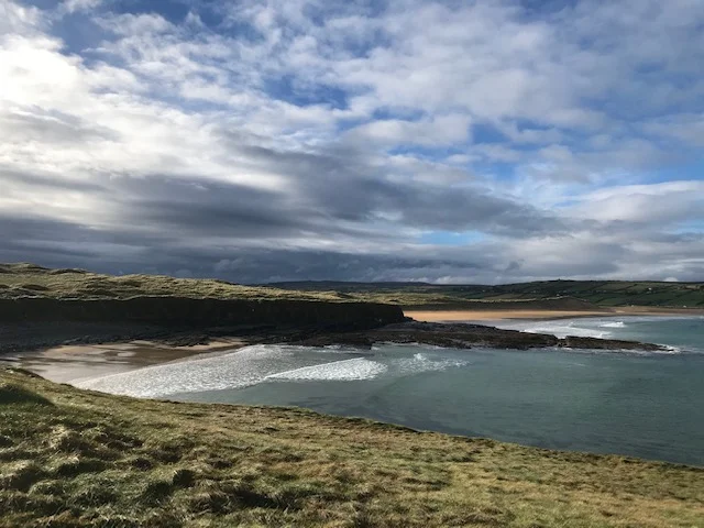 I walked the beach in the far distance, mostly in a soft rain. By the time I got back, the sun was back out. Every hour it changes.